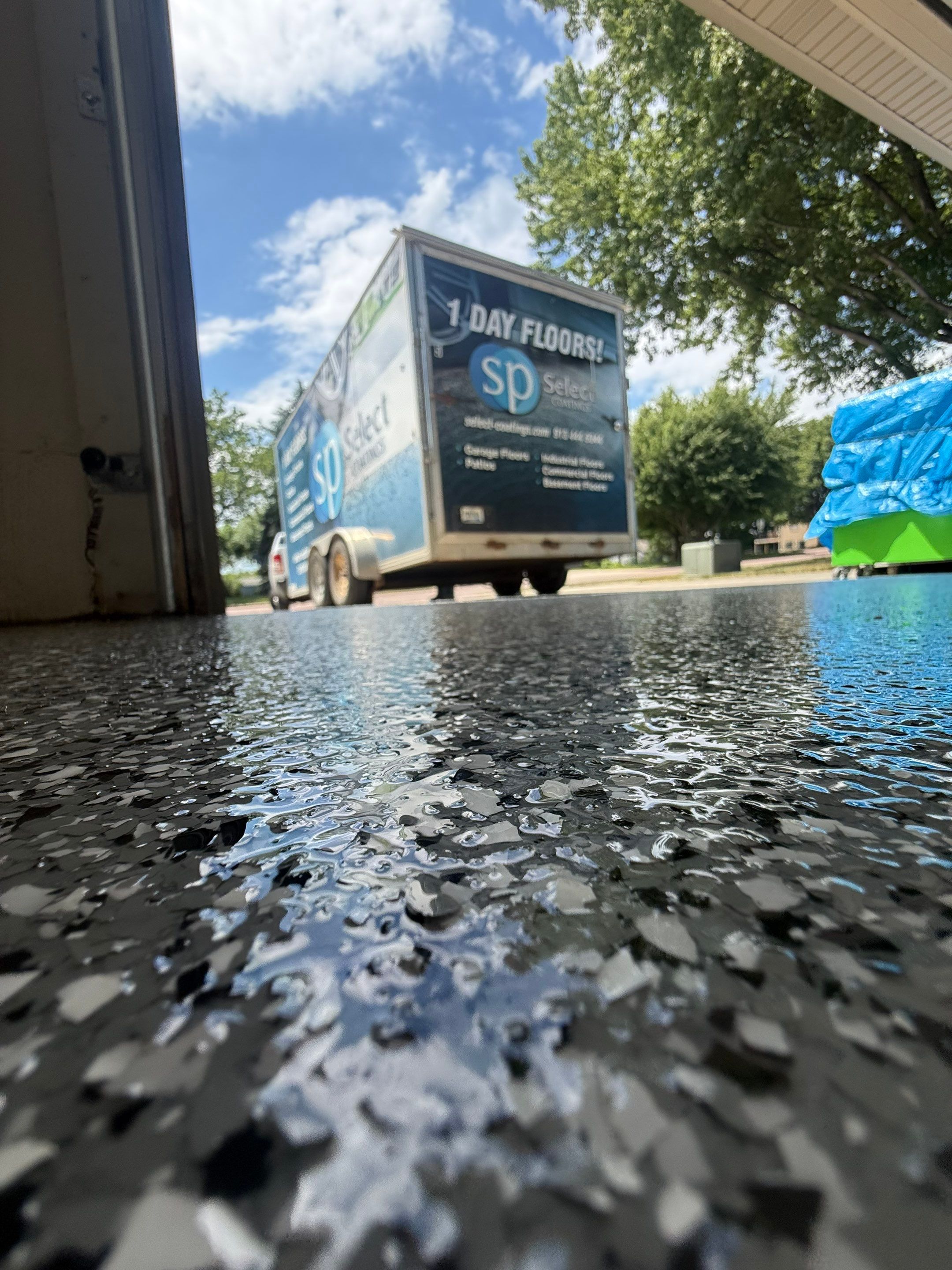 Smoke Flake Garage Floor Coating in Dell Rapids by Select Painting, Coatings & Garage Cabinets