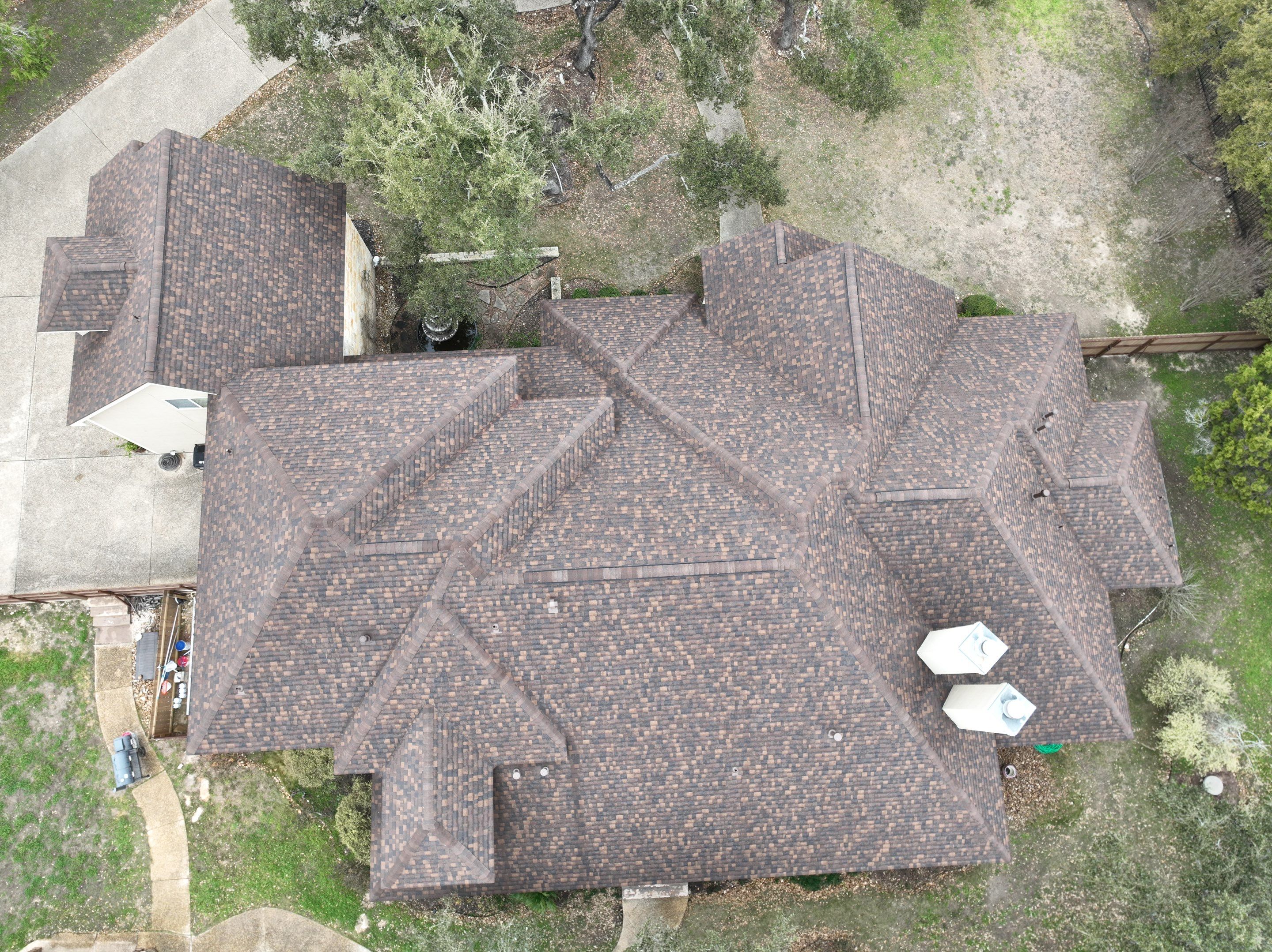 Residential Roof Replacement using 30 Year Laminate Shingles with High Profile Ridge by Premier Roofing and Contracting