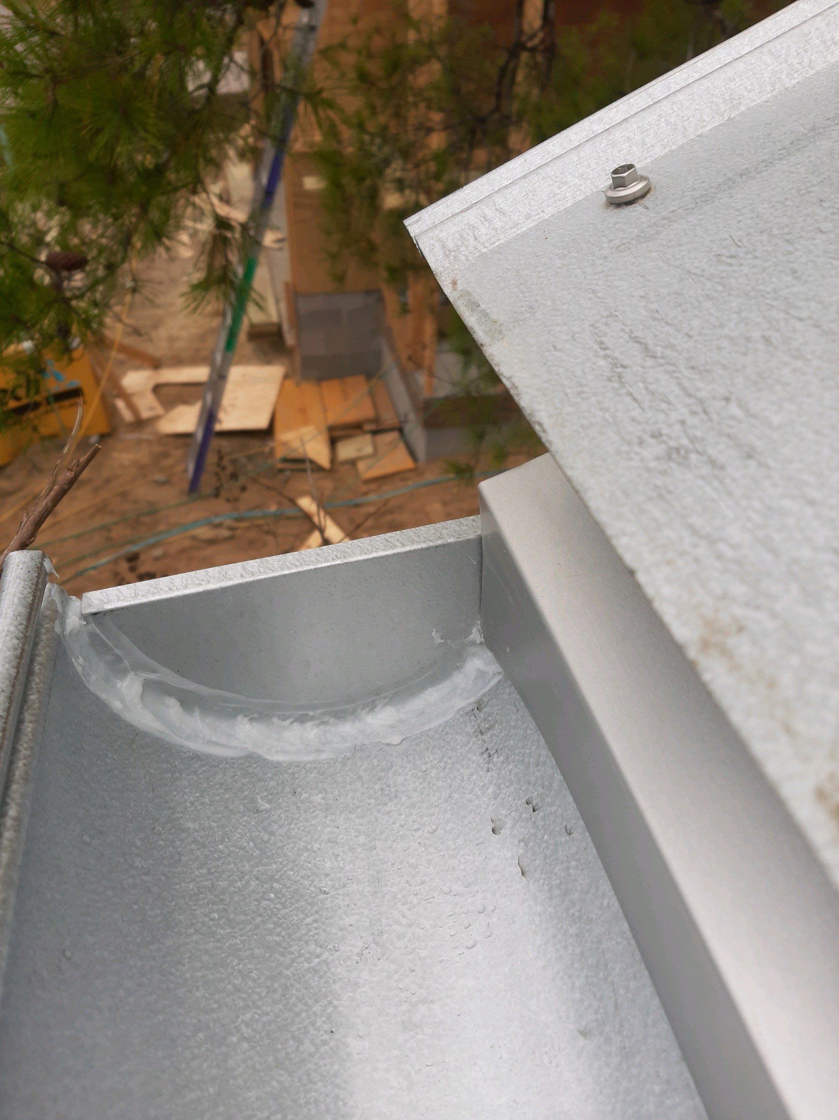 Gutter Installation using Galvalume Half Round Seamless Gutters by Gutter Professors