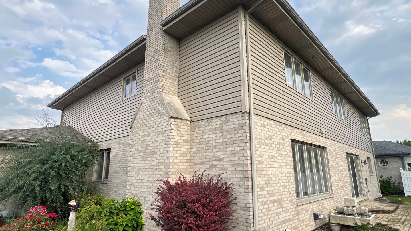 Siding replacement by Optimal Home Improvement 