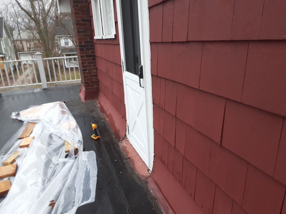 Residential Roof Replacement using Patio Roof by Absolute Roofing and Construction