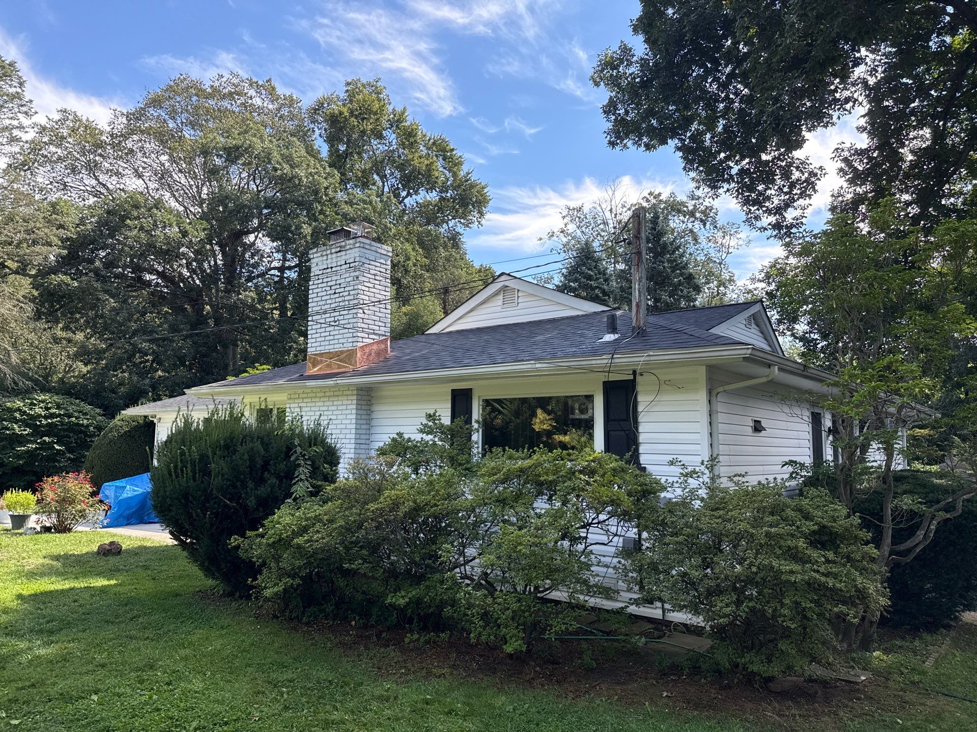 Asphalt Shingle Roof Replacement and Copper Chimney Flashing in Locust Valley by Smart Choice Contracting