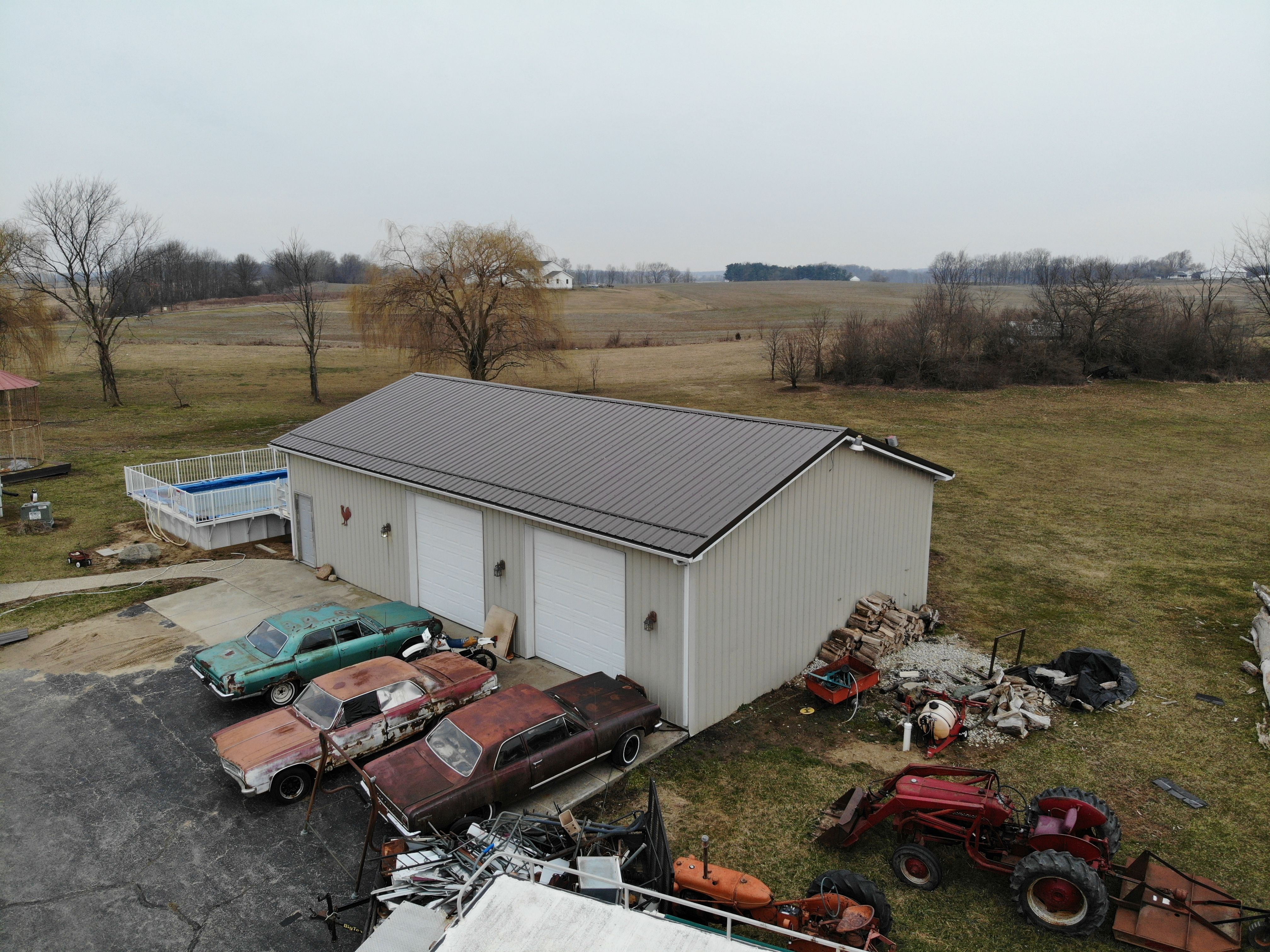 Exposed Fastener Metal Roof on Multi-Home Property in Columbia City, Indiana by 4Ever Metal Roofing