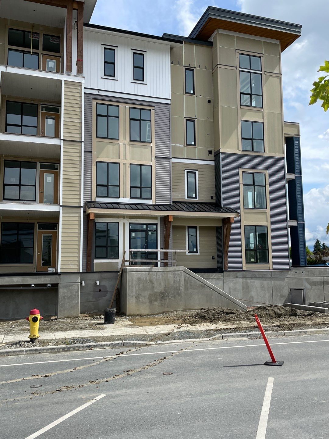 Large apartment with sbs, shingles and prolok metal  by Top Notch Roofing Inc