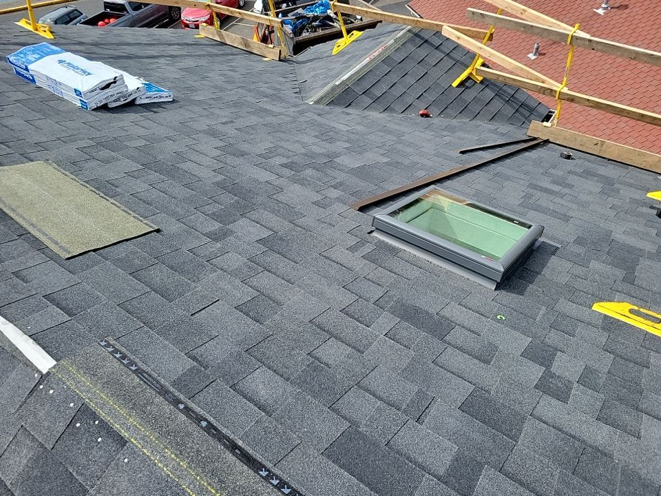 Residential Roofing Installation using Malarkey Highlander with Vented Ridge by Orezona Building & Roofing Company, Inc.