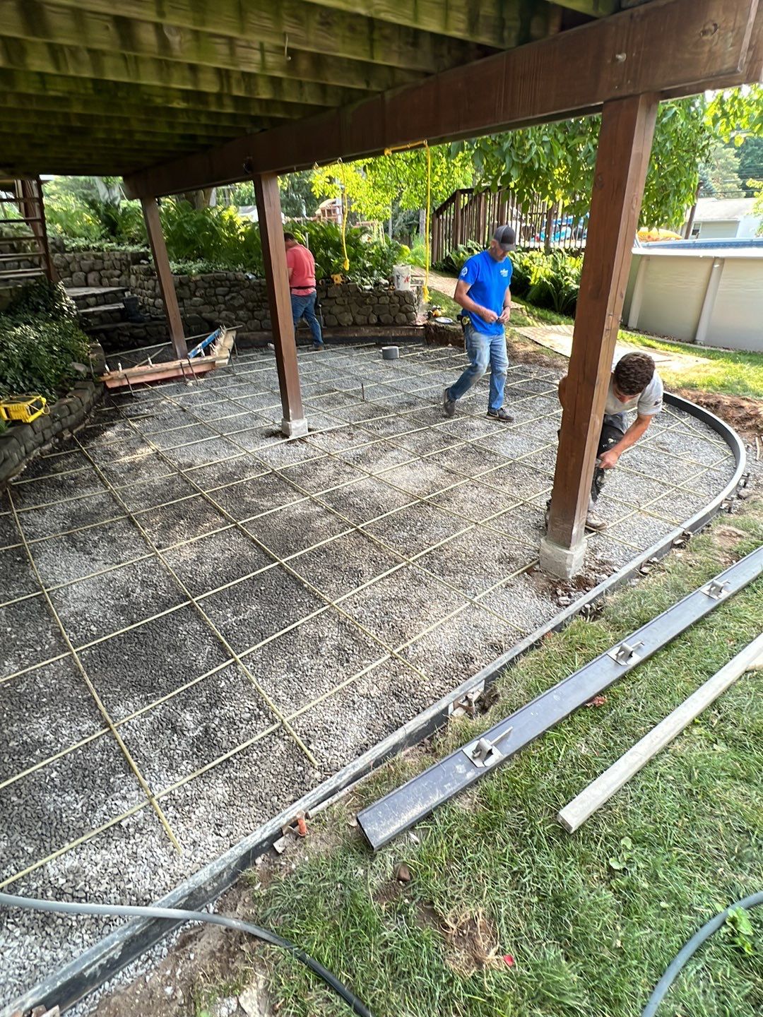 Majestic ashlar stamped concrete patio  by NG Masonry & Construction LLC