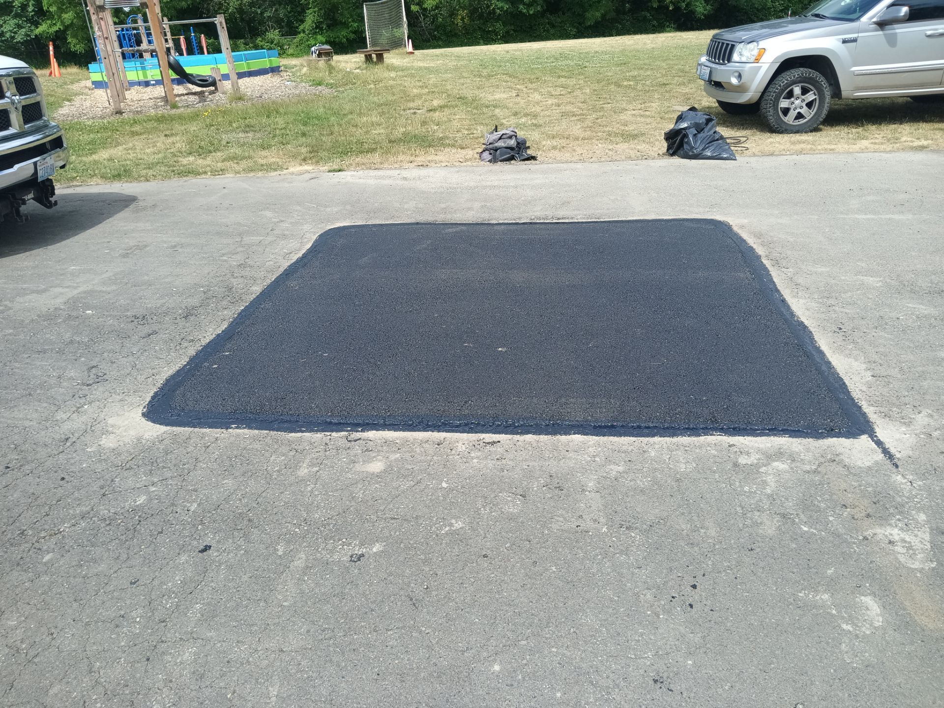 Sealcoat Parking Lot Renovation by Jireh Asphalt & Concrete Inc 
