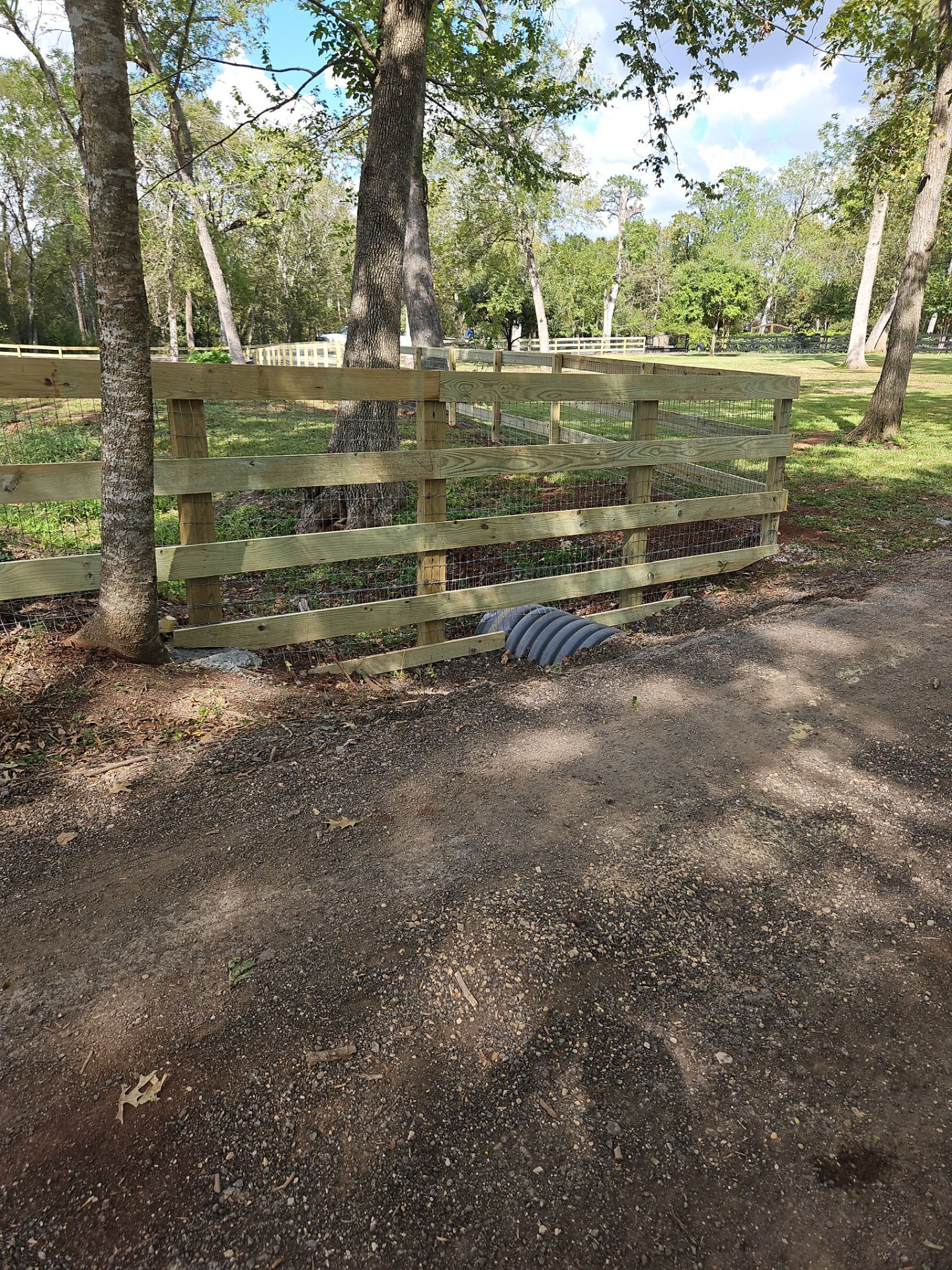 Ranch Style fence Plus Iron installation by Tim's Fences