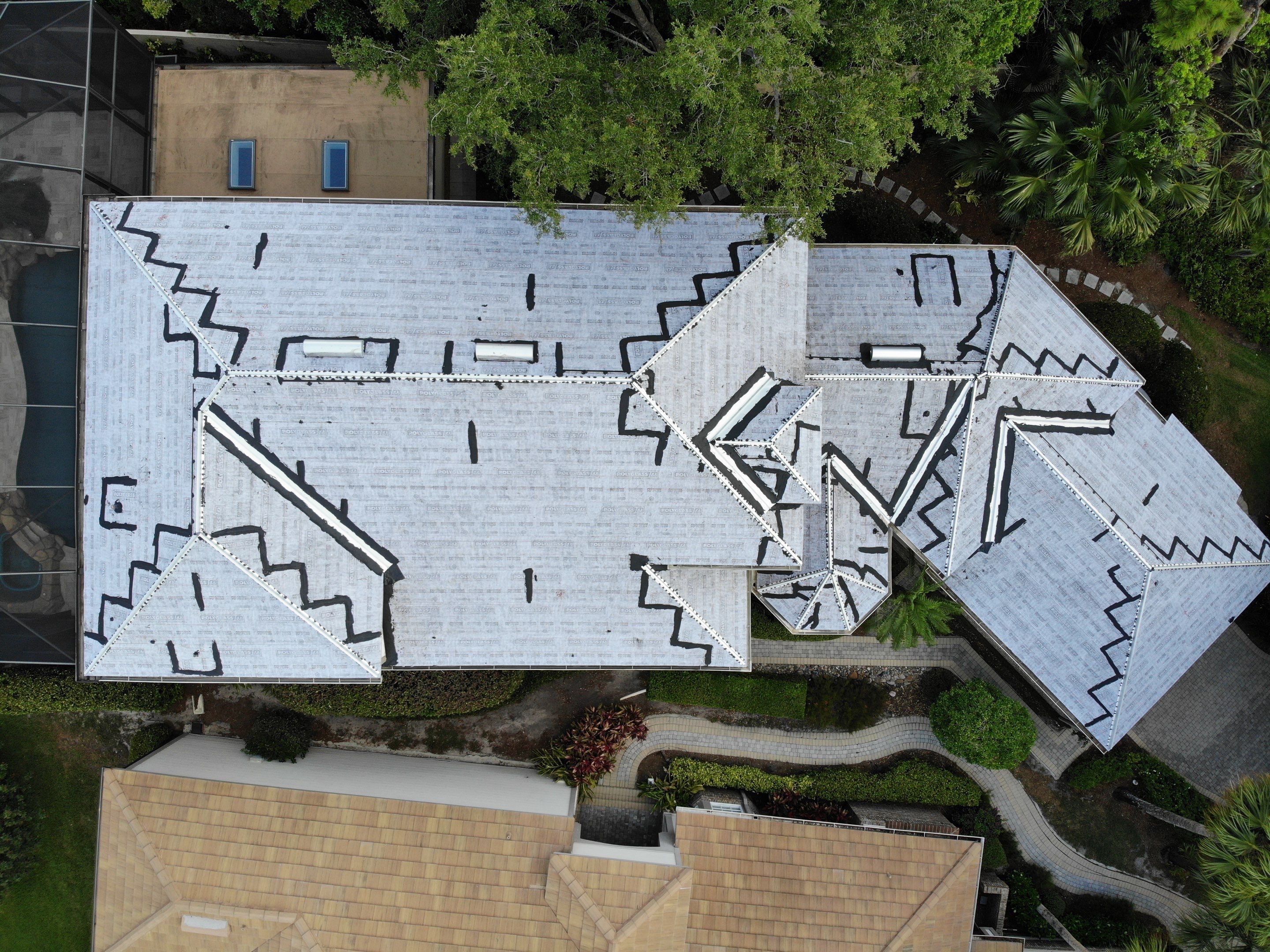 Residential Roofing Installation using Concrete Tile in Bonita Bay Community by International Roofing