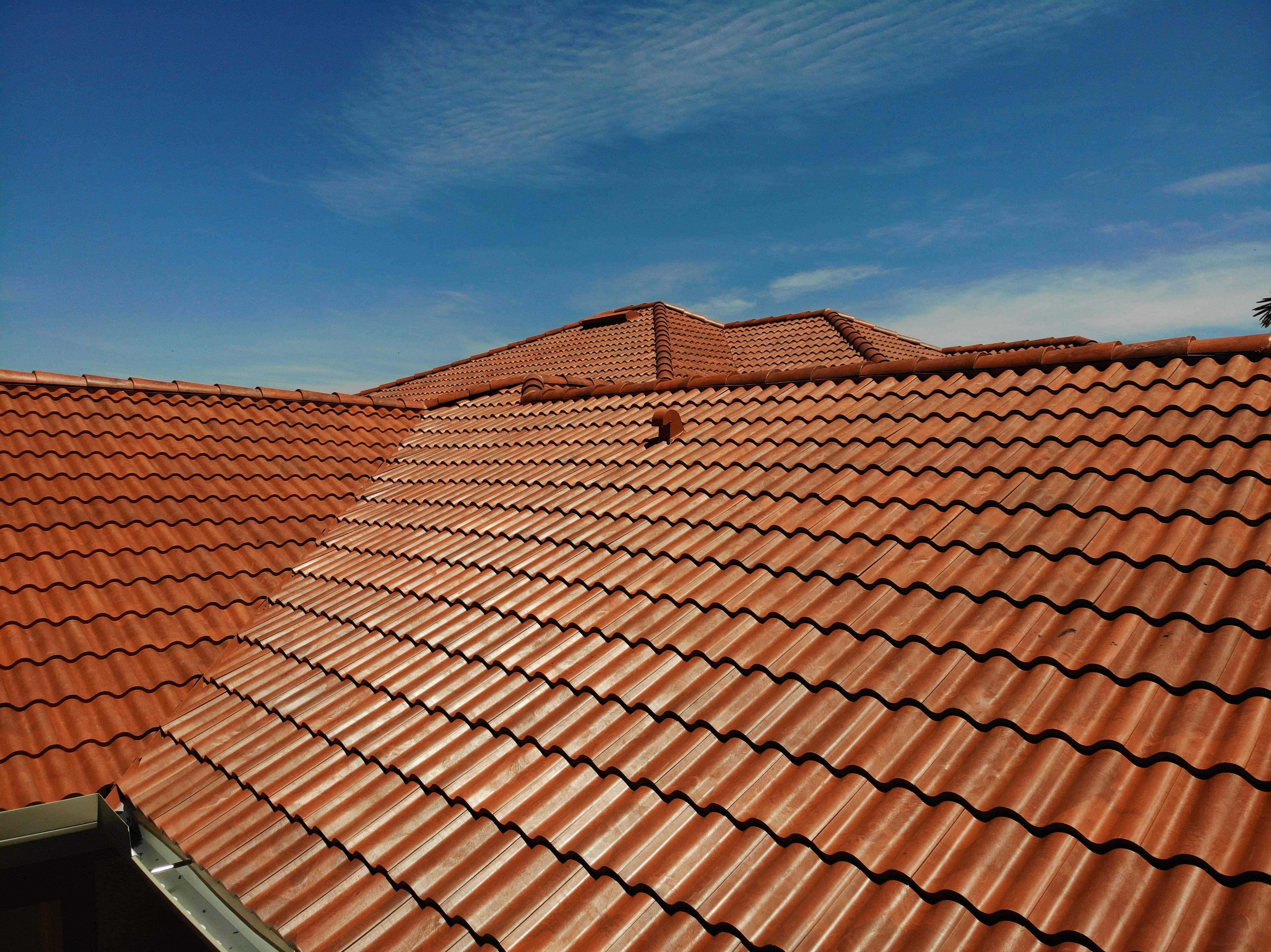 Residential Roofing Installation using Composite Spanish Tile by International Roofing
