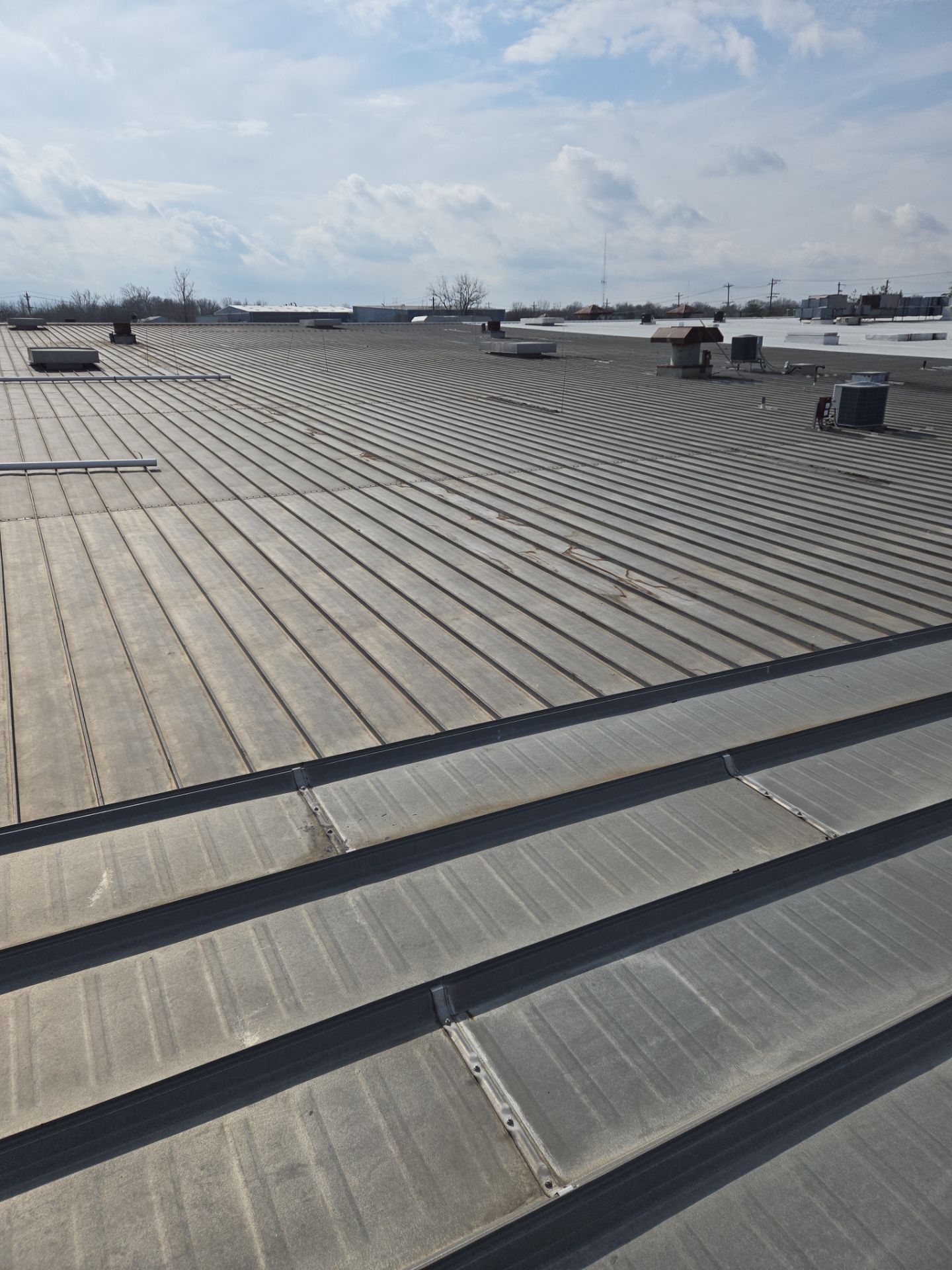 Commercial Metal and Flat Roof Repairs in Mason, Ohio by Level Up Roofing and Restoration Services LLC