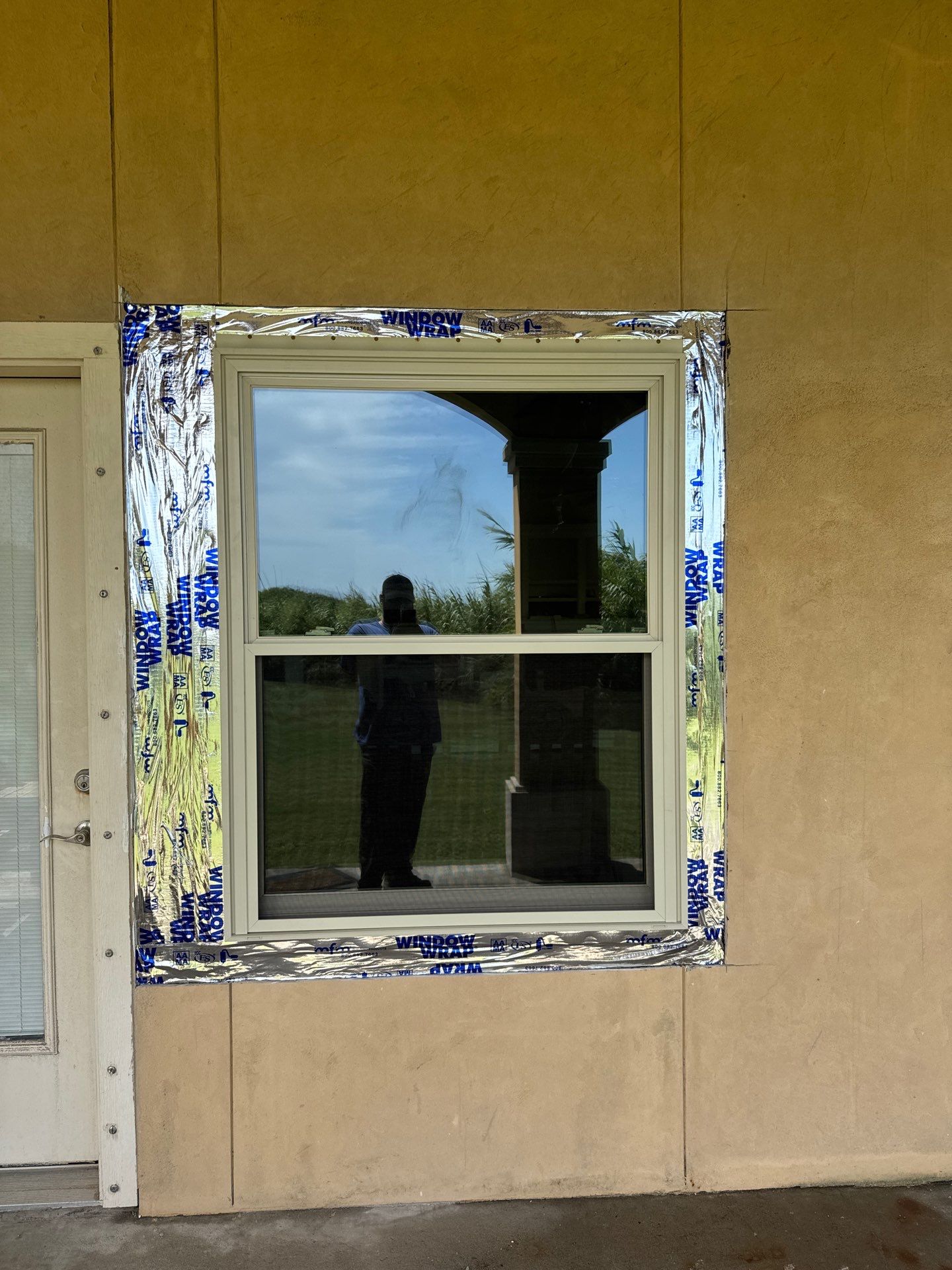 Installing Windows on a Submarine  by Bayfront Roofing and Construction