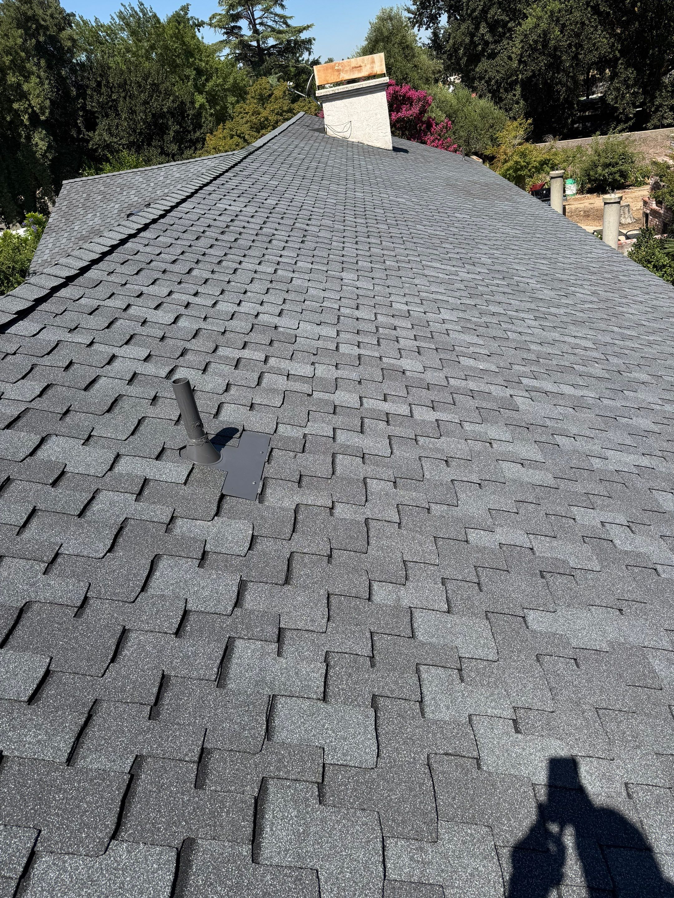 Presidential shingle roof by Straight Edge Roofing Inc