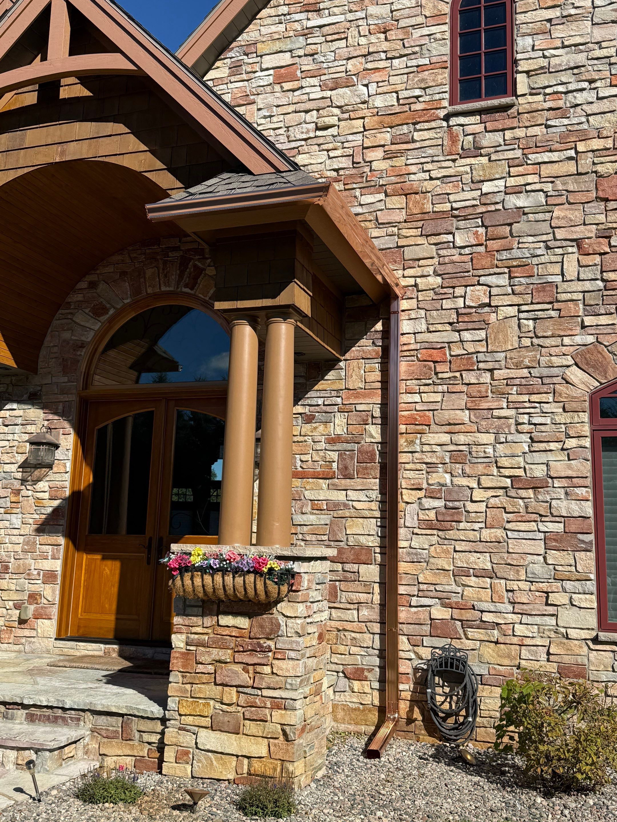 Custom Copper Gutter and Metal Downspout Installation in Williamsburg by Rainbow Seamless Systems