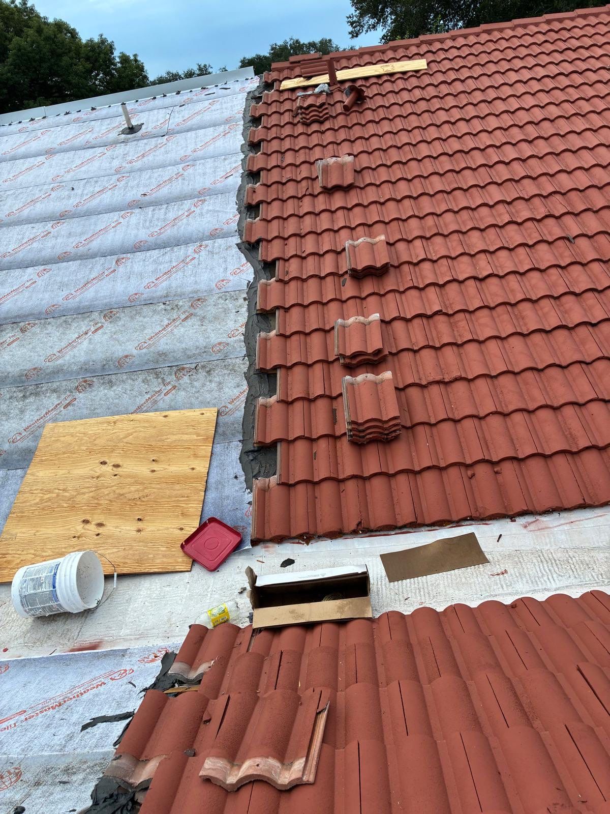 Residential Tile Roof Replacement and Gutter Installation in Winter Park by Pinnacle Roofing Group