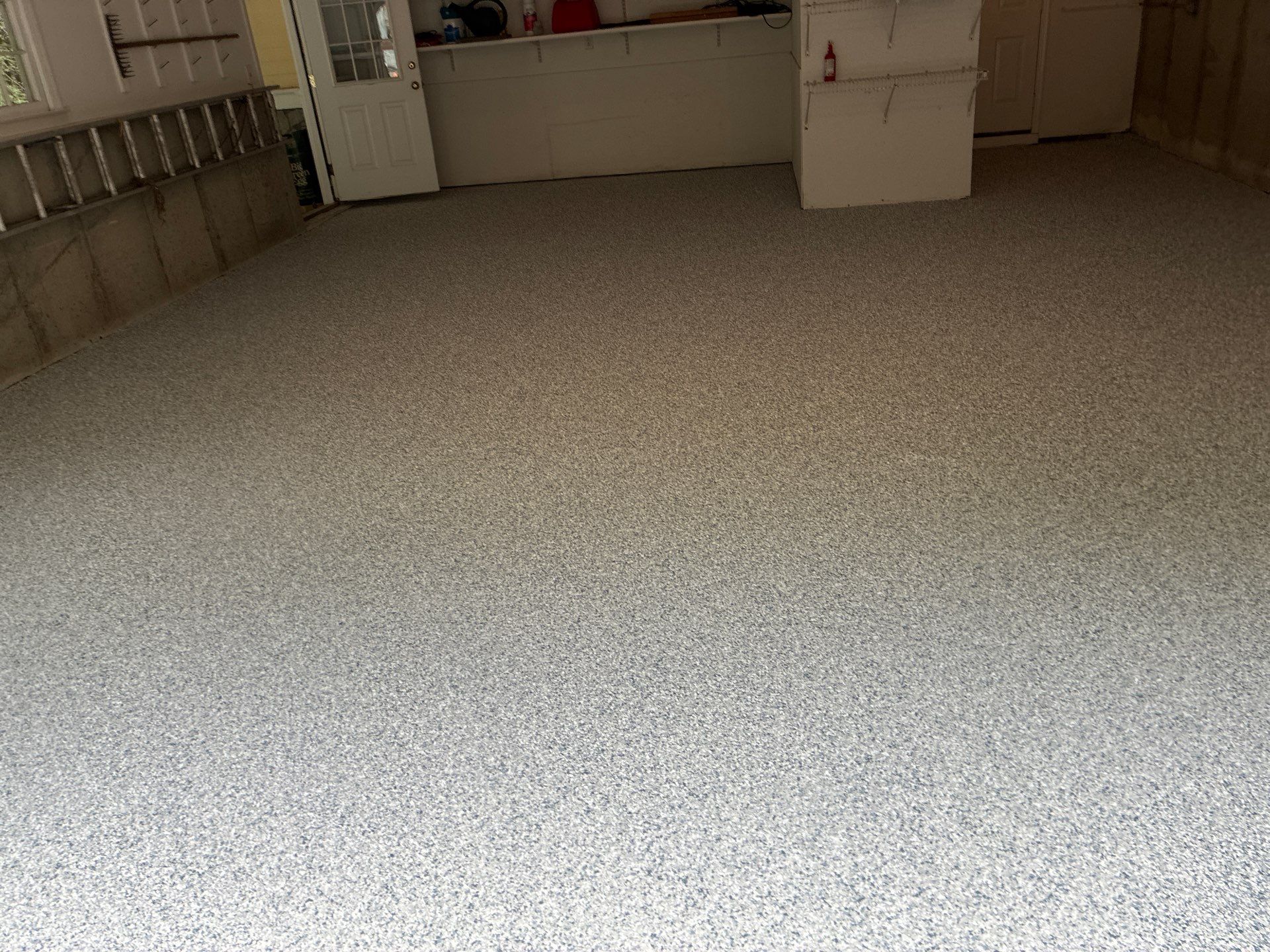 Tidal Wave Concrete Floor Coating Transformation by DiGiorgi Roofing and Siding Inc
