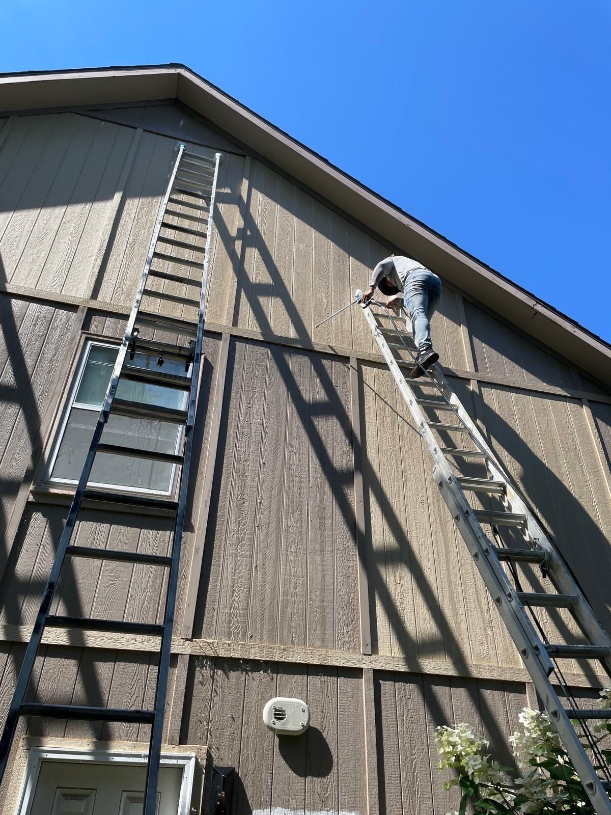 Shoji White Exterior Painting and Comprehensive Wood Rot Repair in Overland Park by Cougar Painting