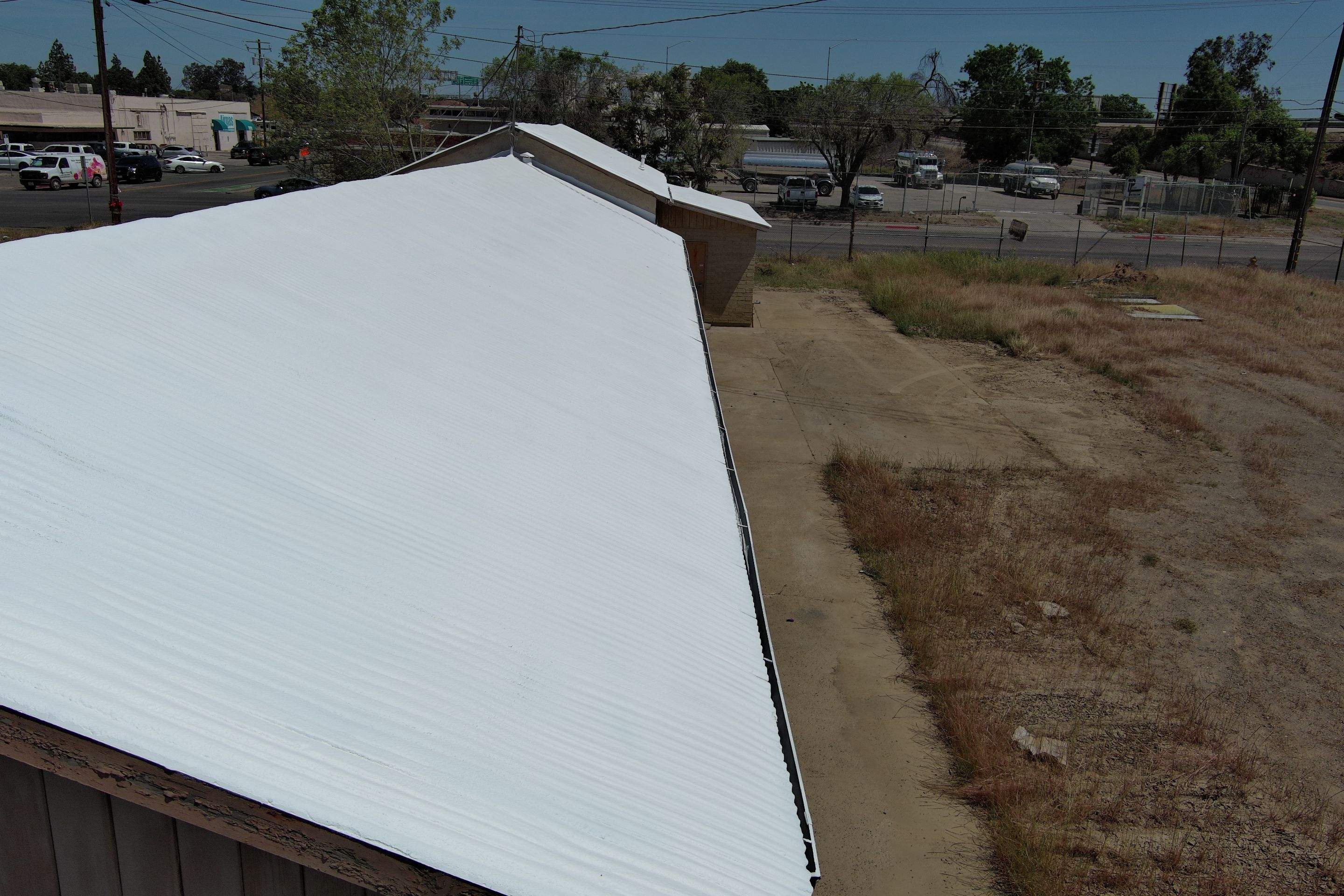 Spray foam and coatings using Conklin Benchmark/PUMA XL by Straight Edge Roofing Inc