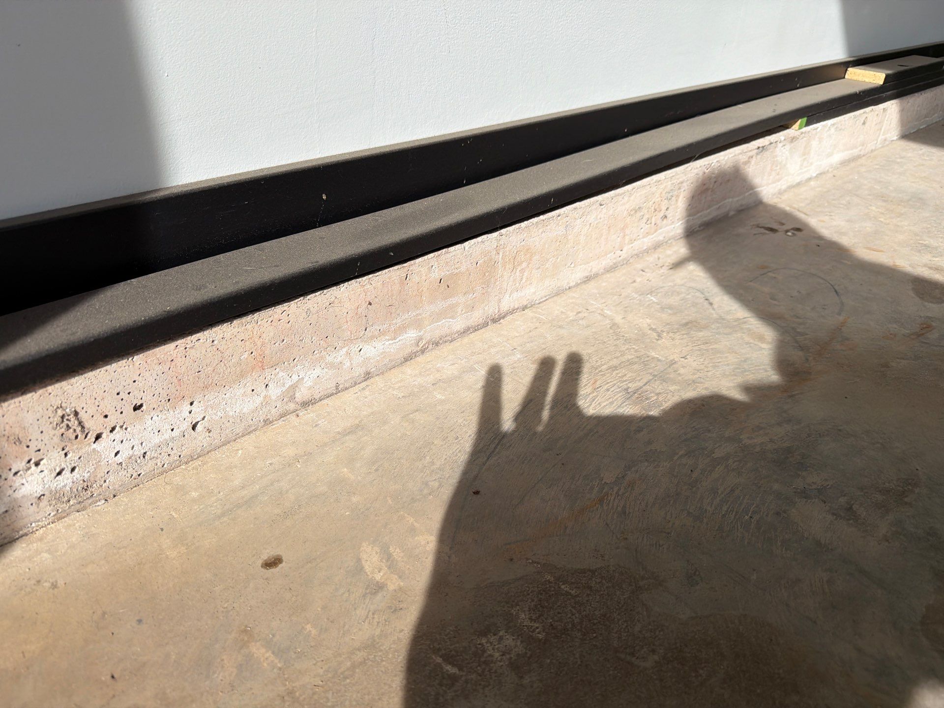 Custom Epoxy Garage Floor Coating Installation in Sioux Falls by Select Painting, Coatings & Garage Cabinets