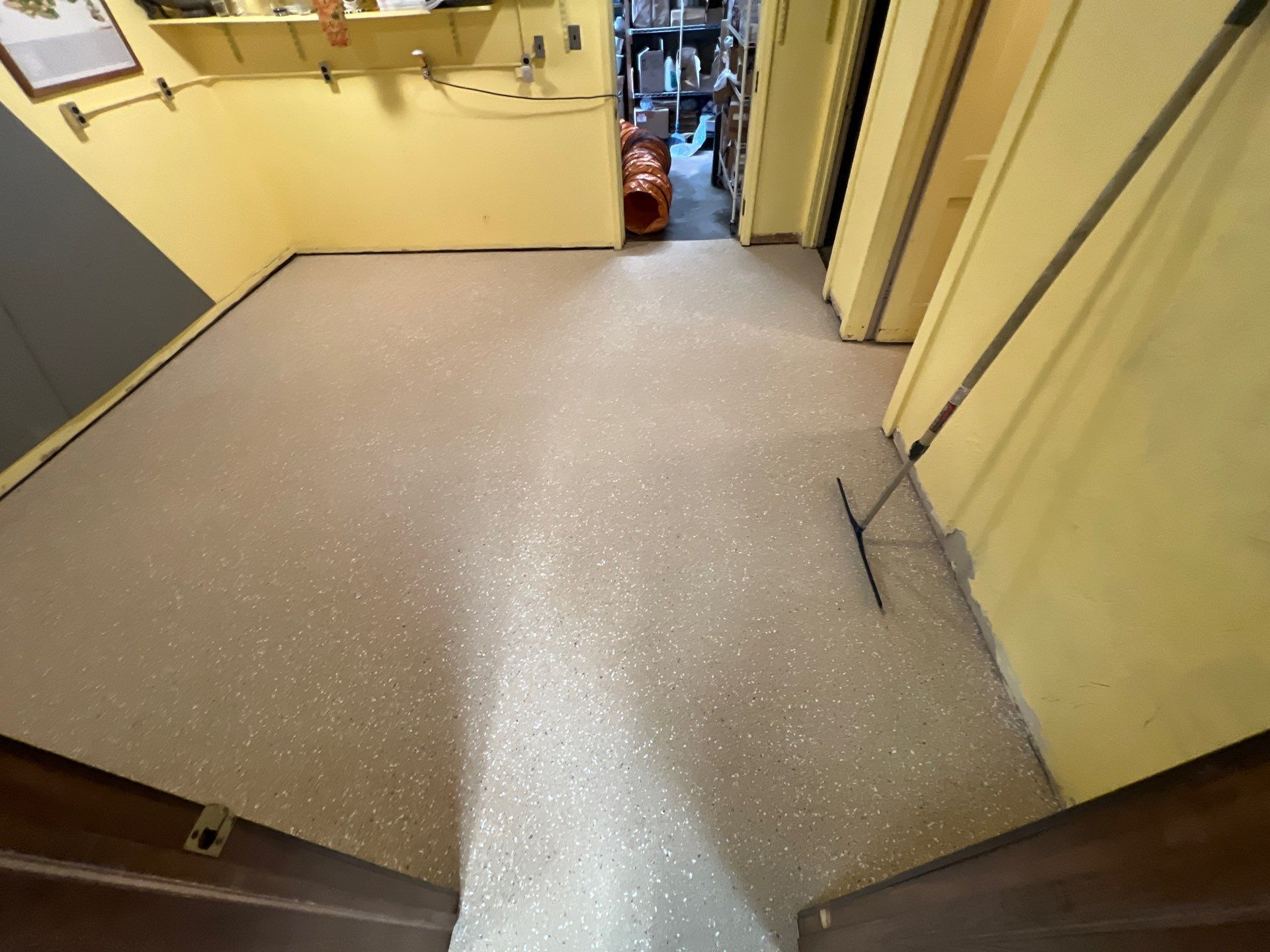 Epoxy Flooring Installation – Downtown Muskegon Commercial Space by Gordon Painting
