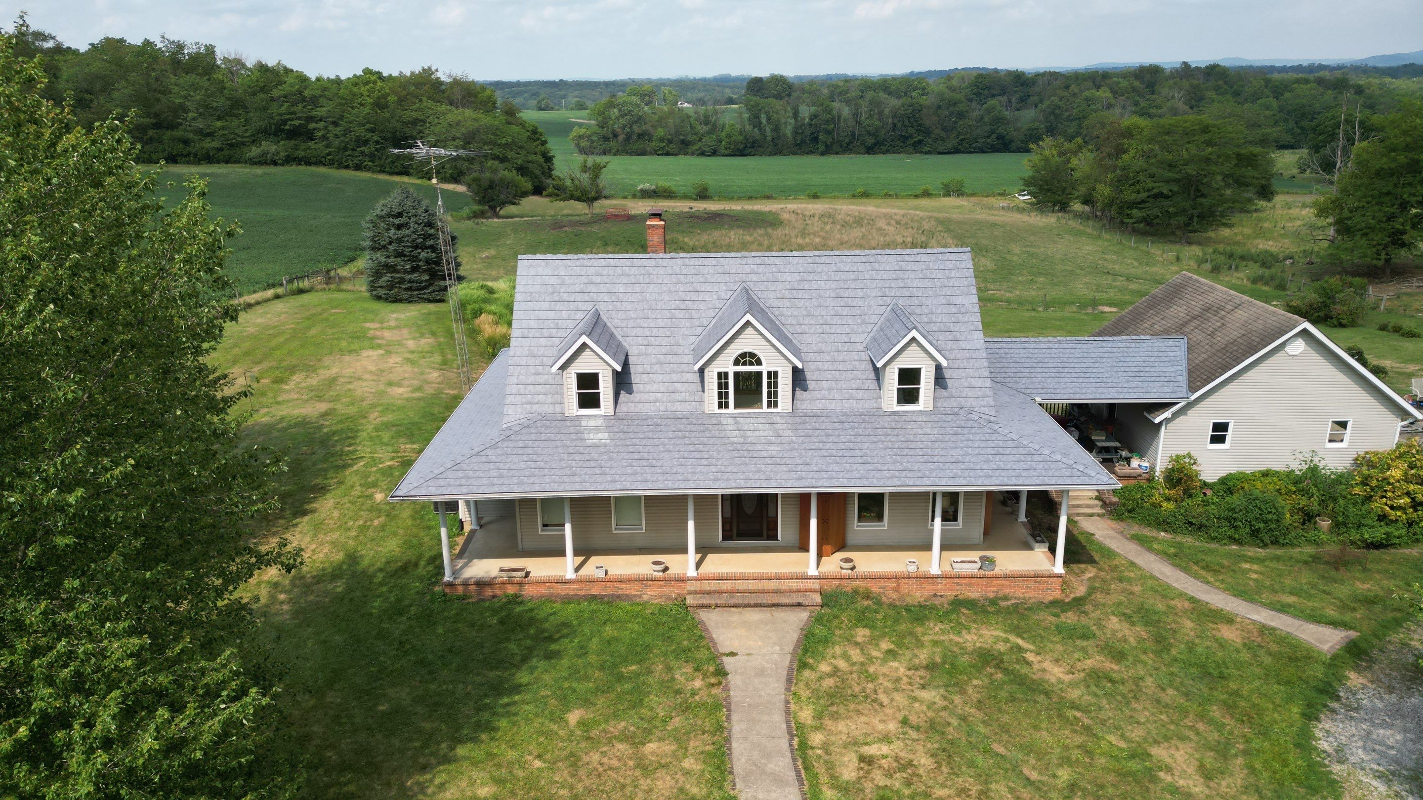 Residential Roofing Installation using ProVia Ironstone Slate Metal Roofing by RoofX 
