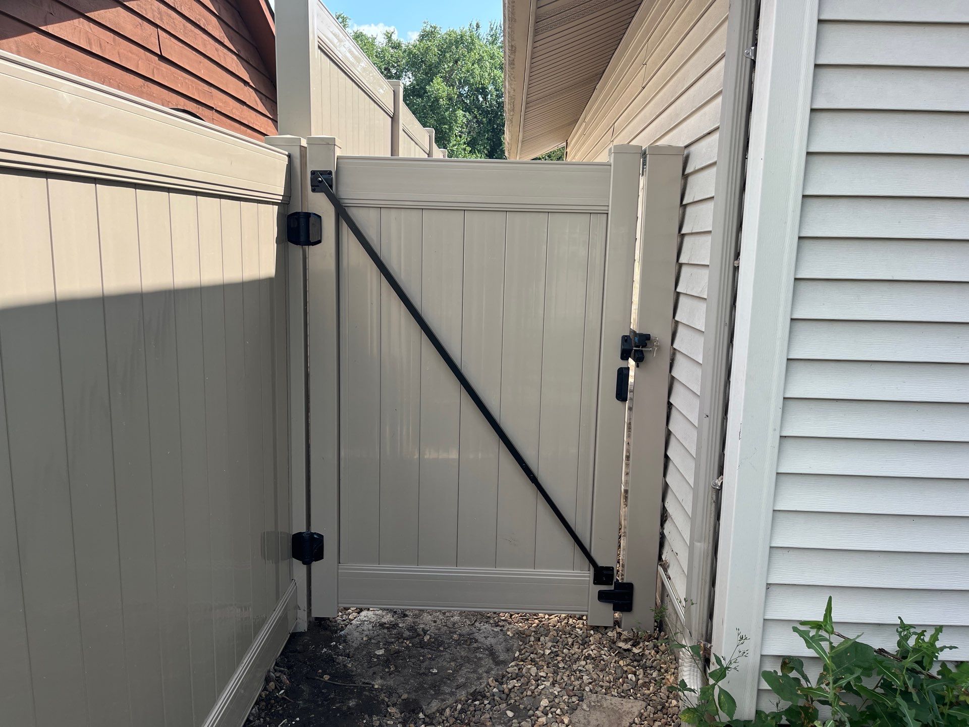 Adobe Vinyl Privacy Fence and Gate Installation in Waterloo by Perfect Picket Fence and Stain