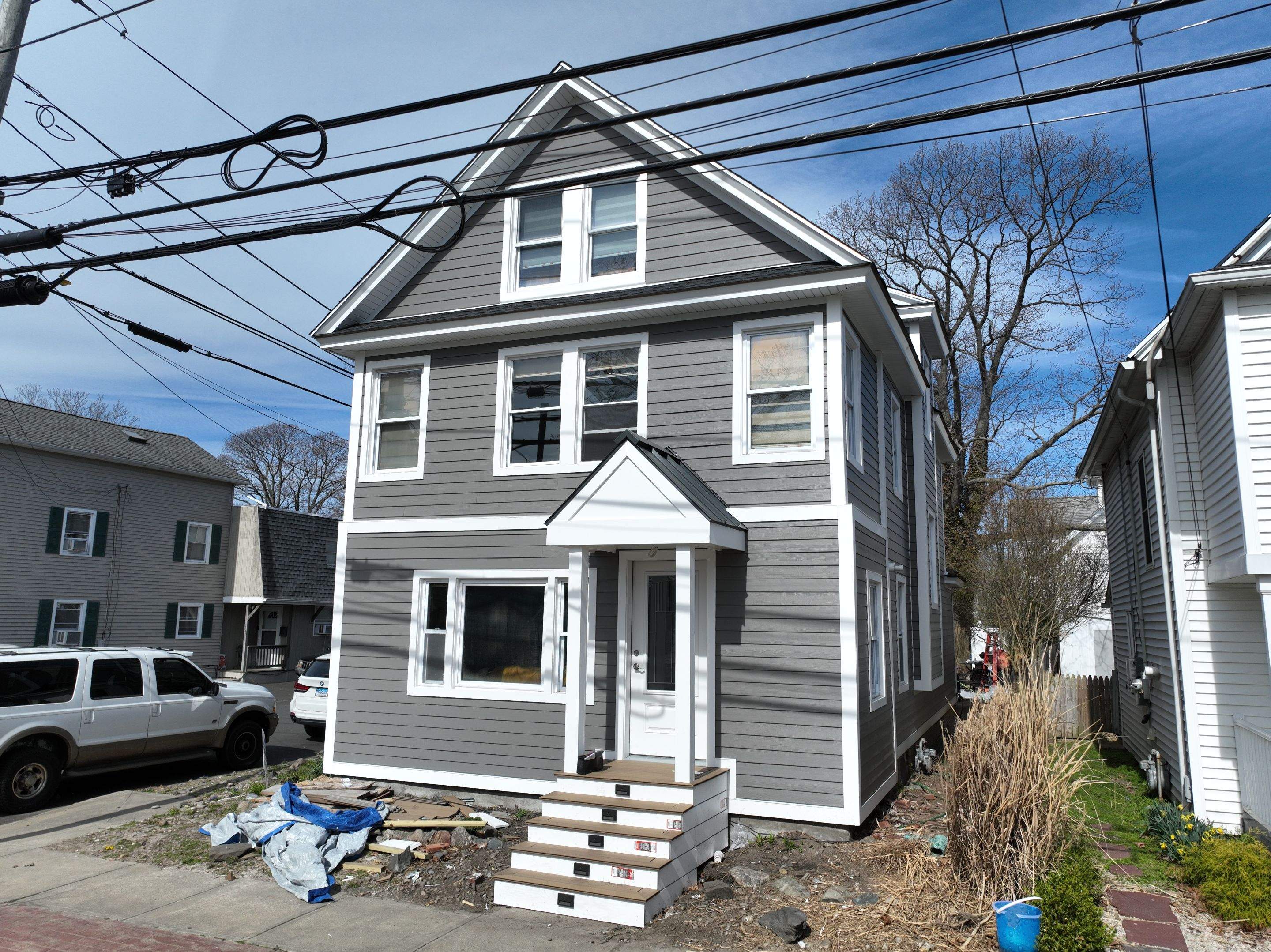 Siding Installation using Hardie Plank Aged Pewter by A Plus Exterior