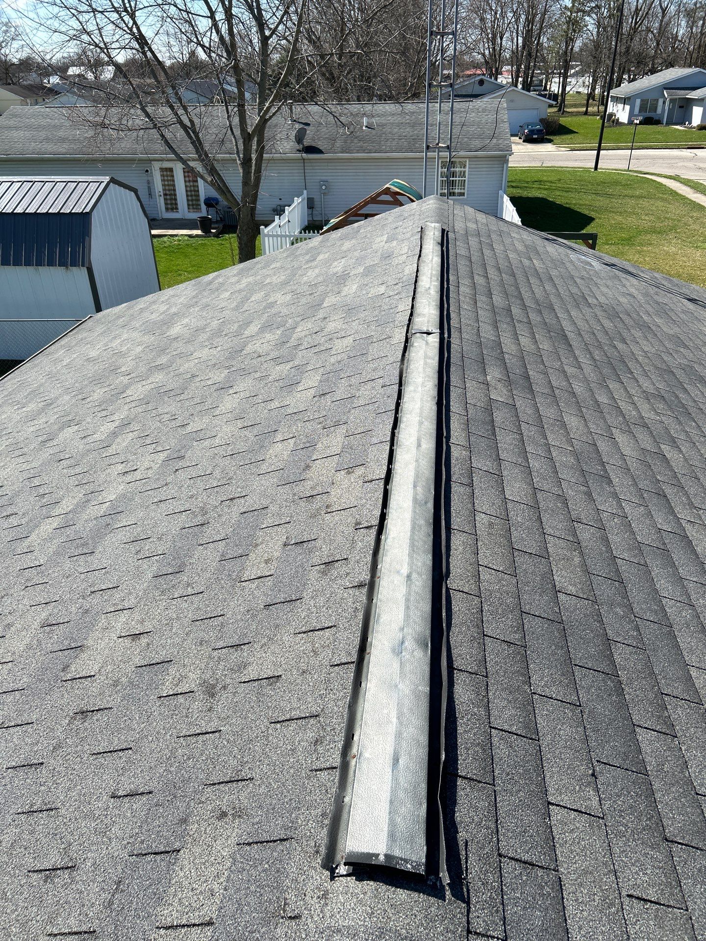 Storm Damage Residential Roof and Siding Installation by WIW Enterprises Inc