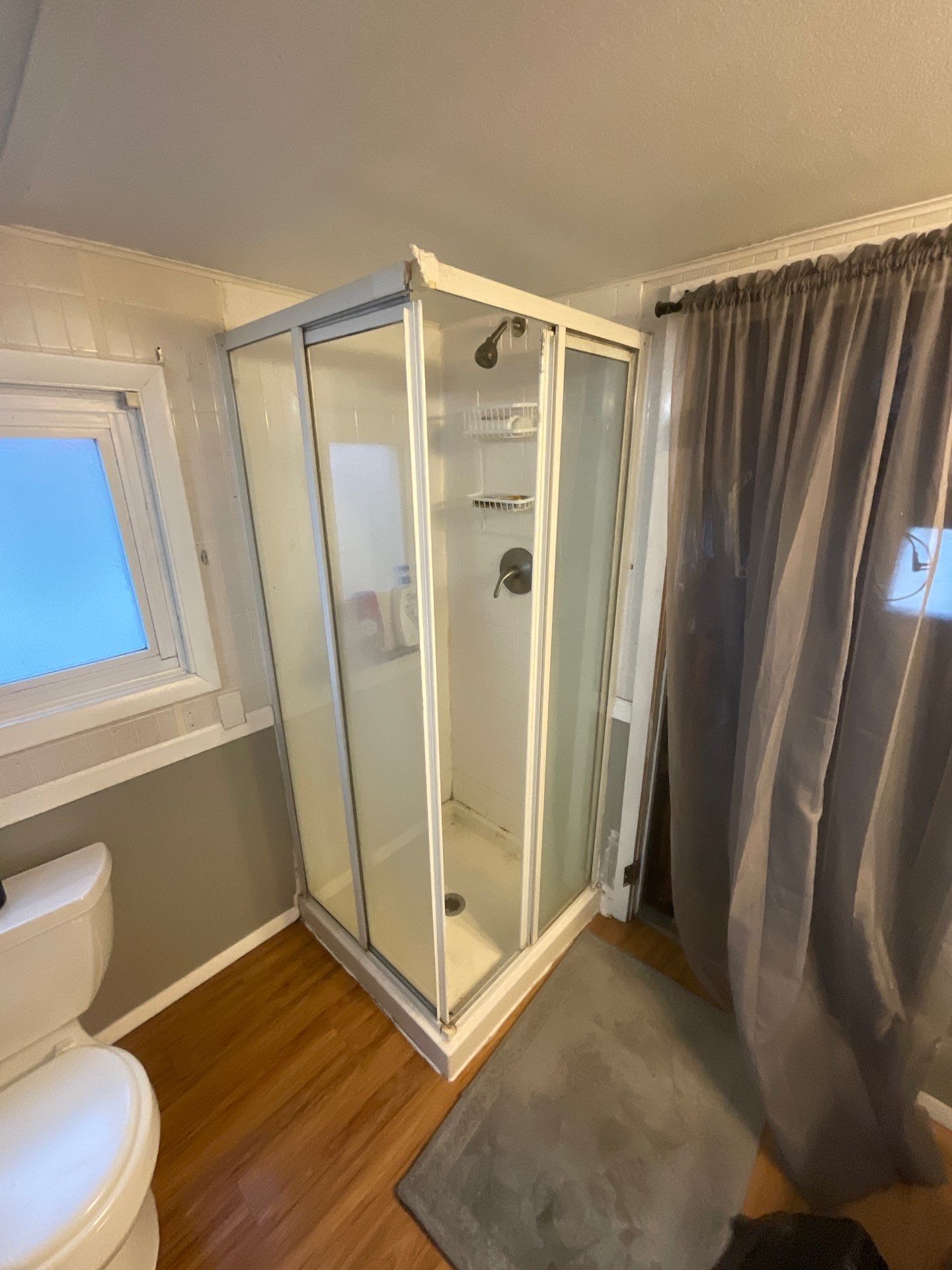 Traverse City Corner Shower Replacement With Textured Wall Panels by Rainbow Seamless Systems