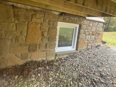 Entry Door and Window Installation for Nashville Stone Home by Merrifield Exteriors, LLC