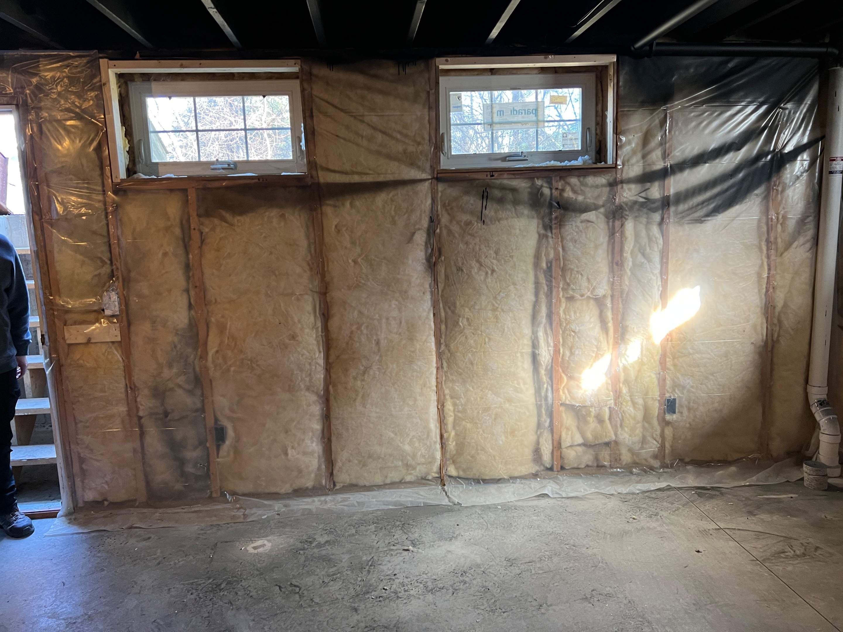 Basement Remodel w/ LVP Flooring & Exposed Ceiling by Chagnon Building & Remodeling LLC