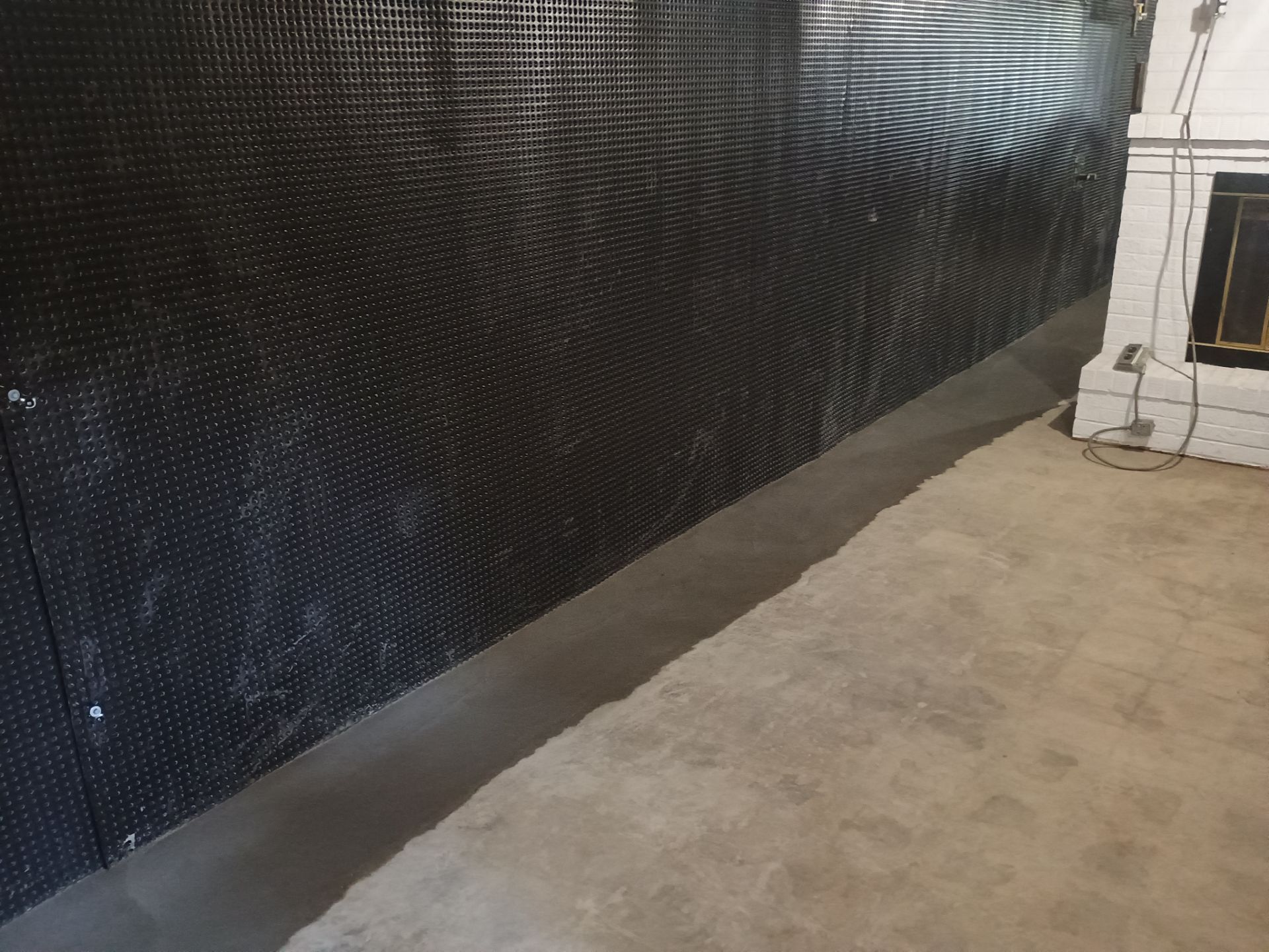 Interior Drain Tile & Wall Drainage in Southwest Minneapolis by Waterproofing Northeast