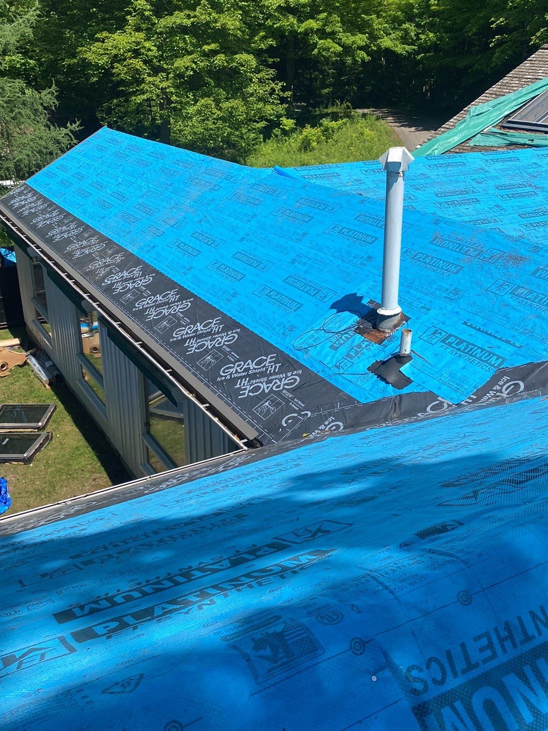 Residential Roofing Installation using 24 Ga Standing Seam Meta by Jay Carter Roofing & Sheet Metal