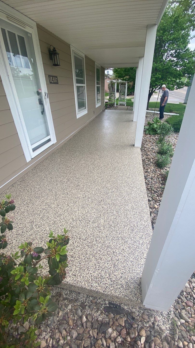 Patio using Cordwood by Select Painting, Coatings & Garage Cabinets