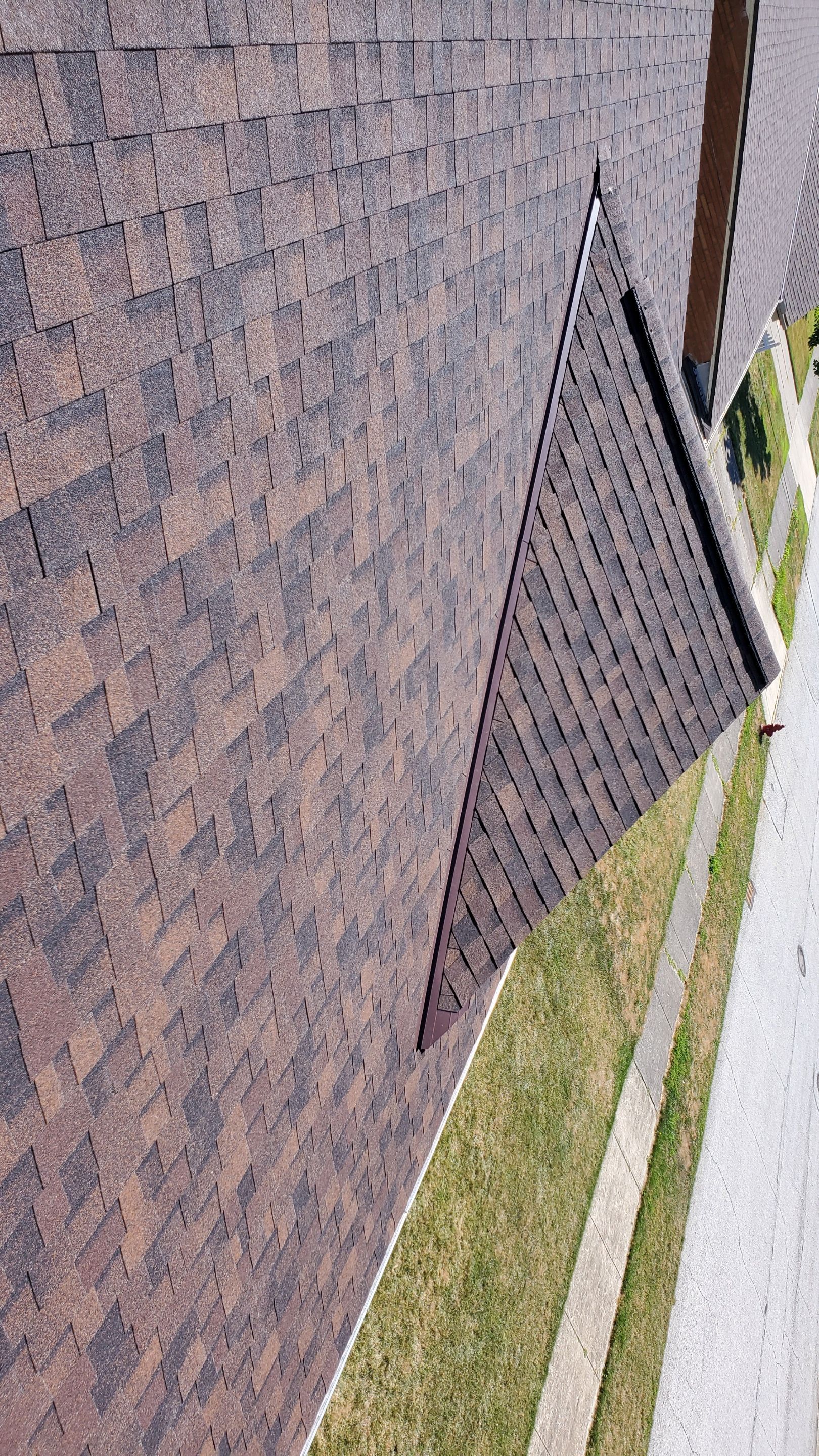 Residential Roofing Installation using Ownens Corning Duration Brownwood by Absolute Roofing and Construction
