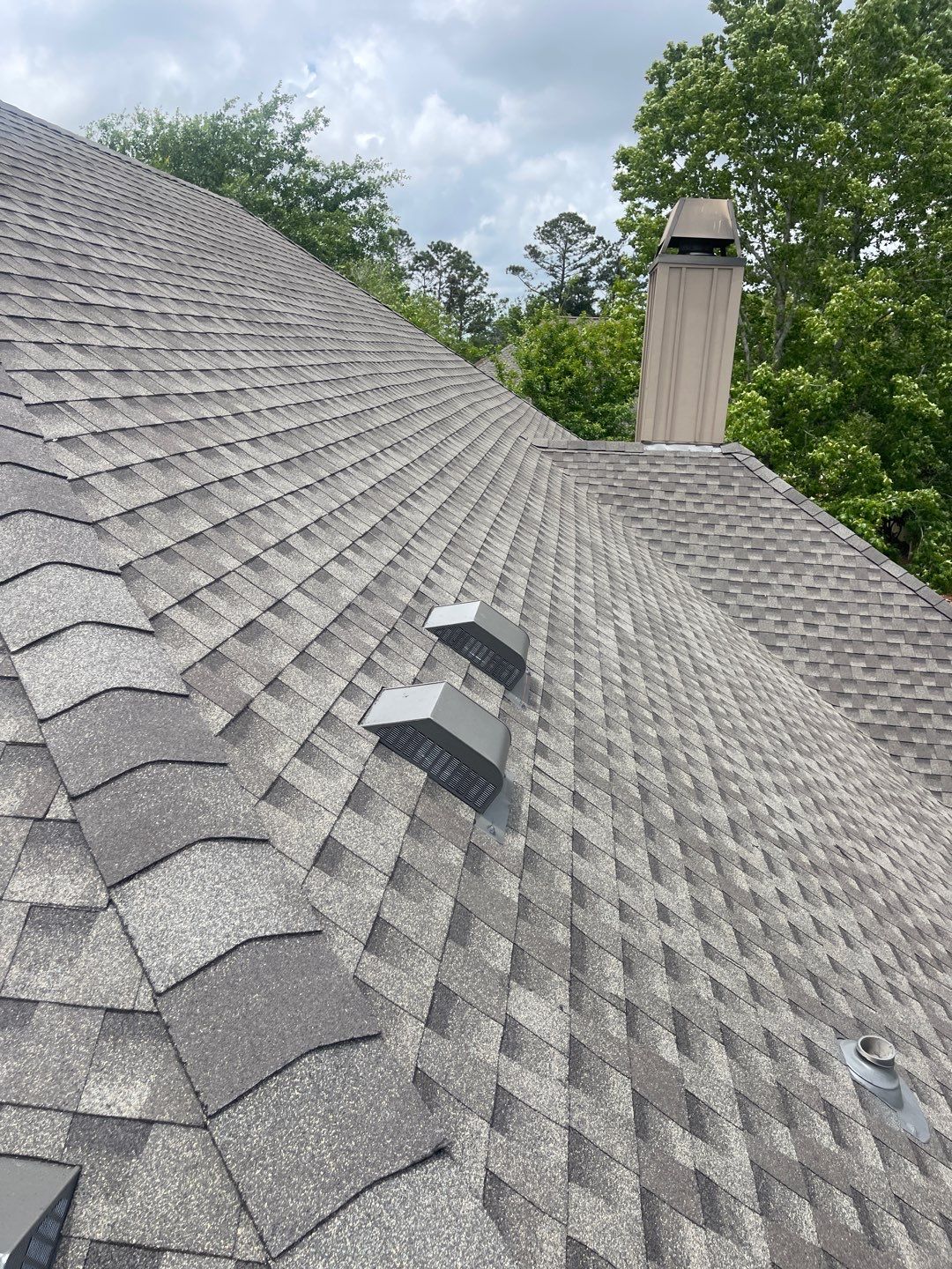 Residential Roofing Installation using Roof Replacement by American Roofing & Construction LLC