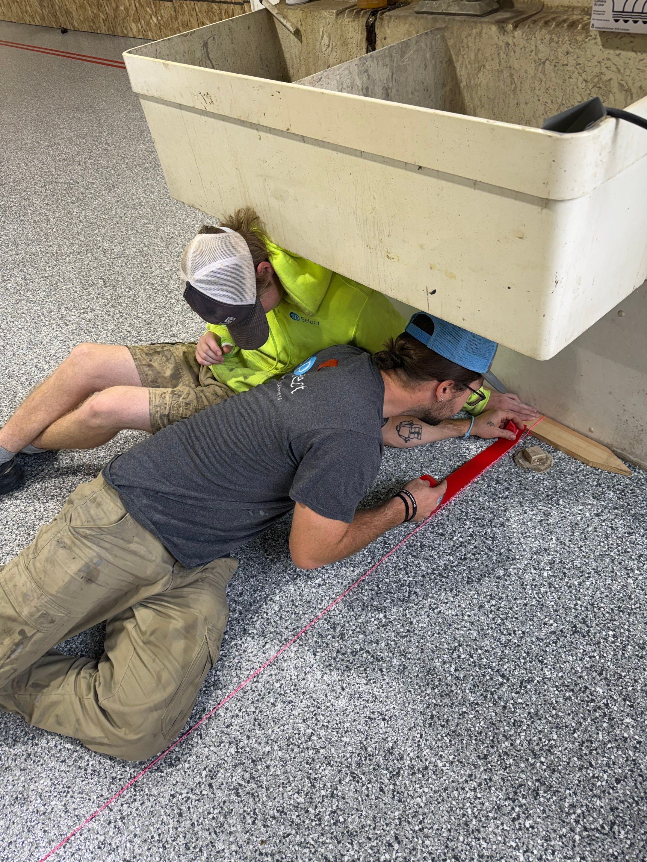 Custom Polyurea Shop Floor with Basketball Court Lines in Rock Valley by Select Painting, Coatings & Garage Cabinets
