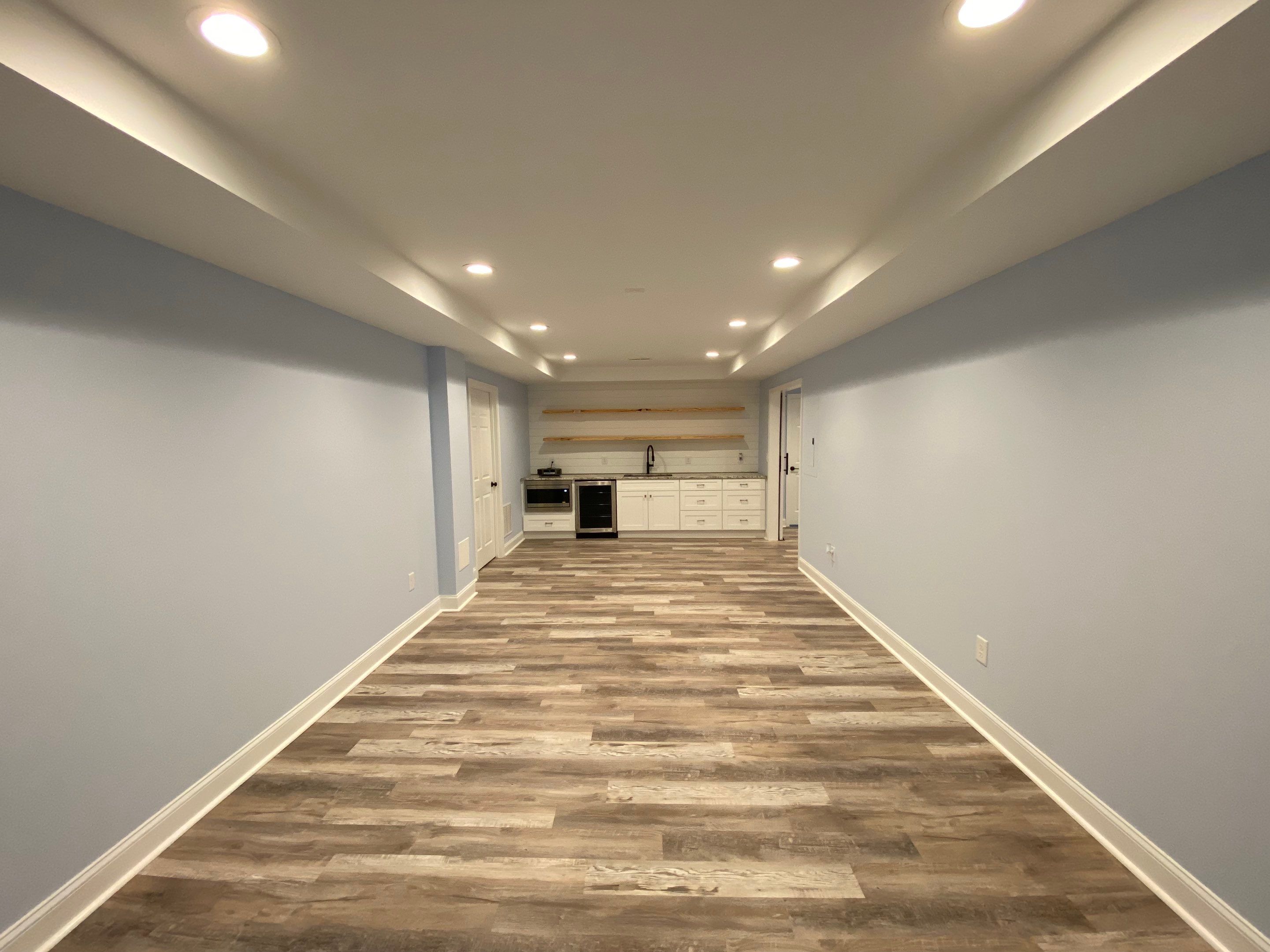 Marietta Basement Remodeling Featuring Custom Wet Bar and Marble Shower by Swift Home Renovations