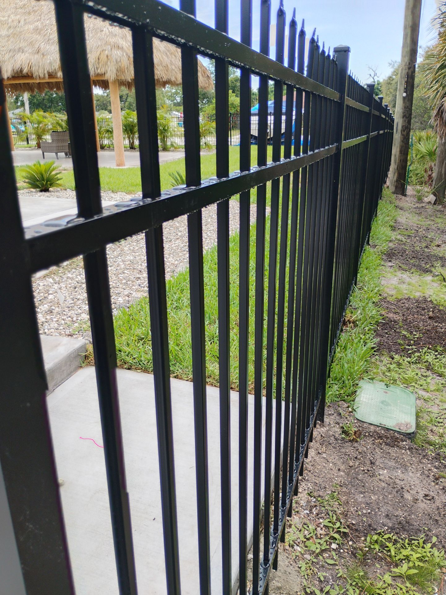 Black Aluminum Spear Top Picket Fence Installation in Englewood by True Fence LLC