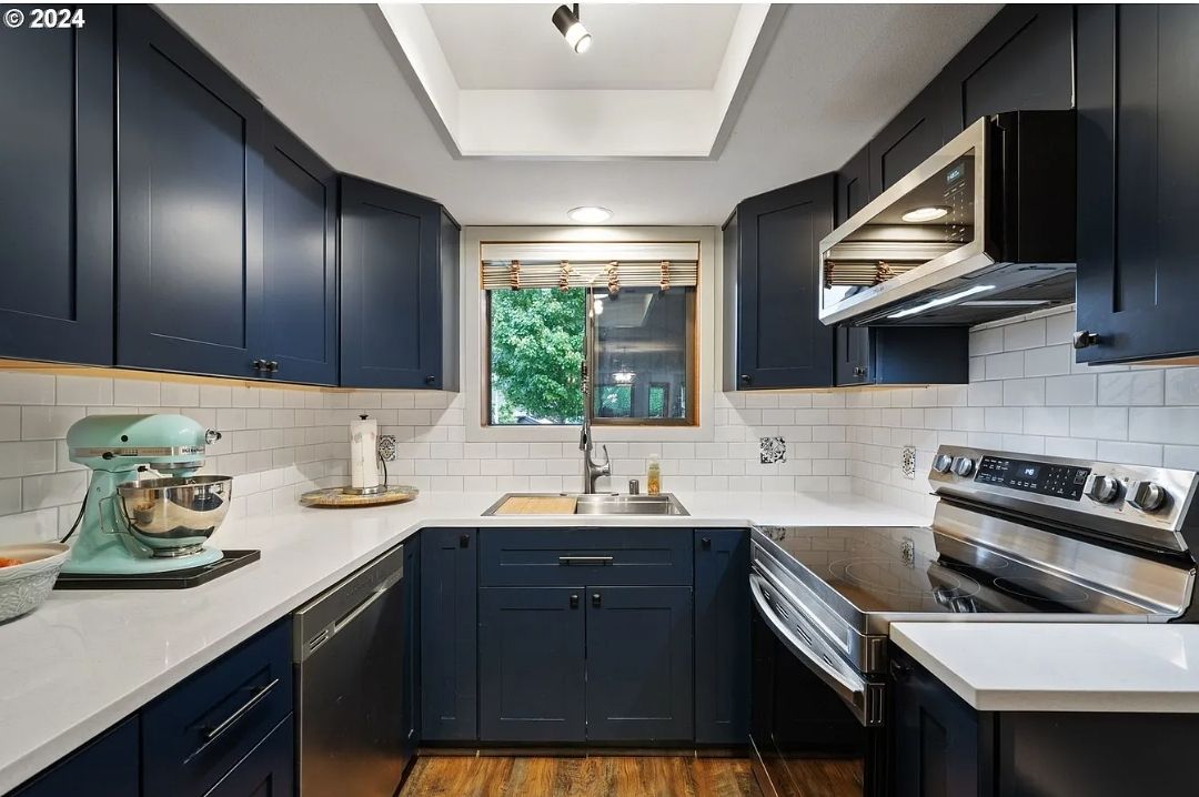 outdated Kitchen to a modern and simplistic kitchen area by Crm Services Llc