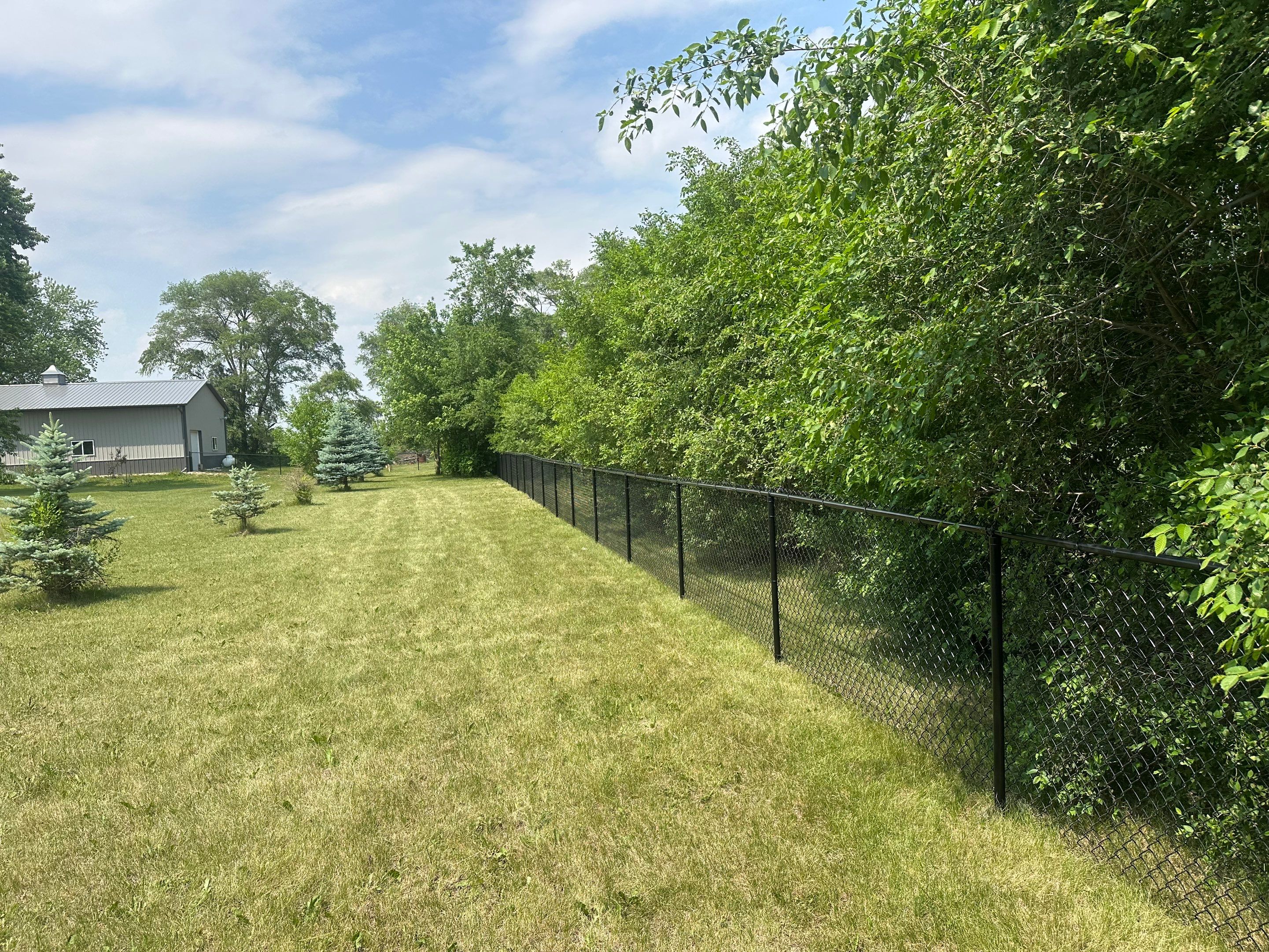 Project in Janesville by Perfect Picket Fence and Stain