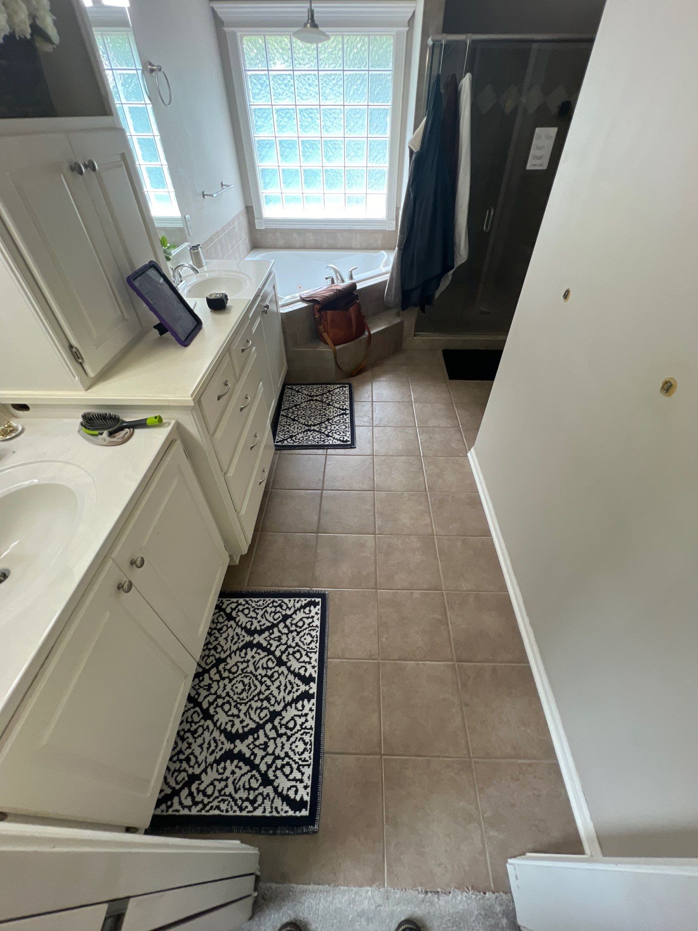 Full bathroom remodel with Artus lighted mirrors, Waltz bathtub and Mercury doors by The Shower Company