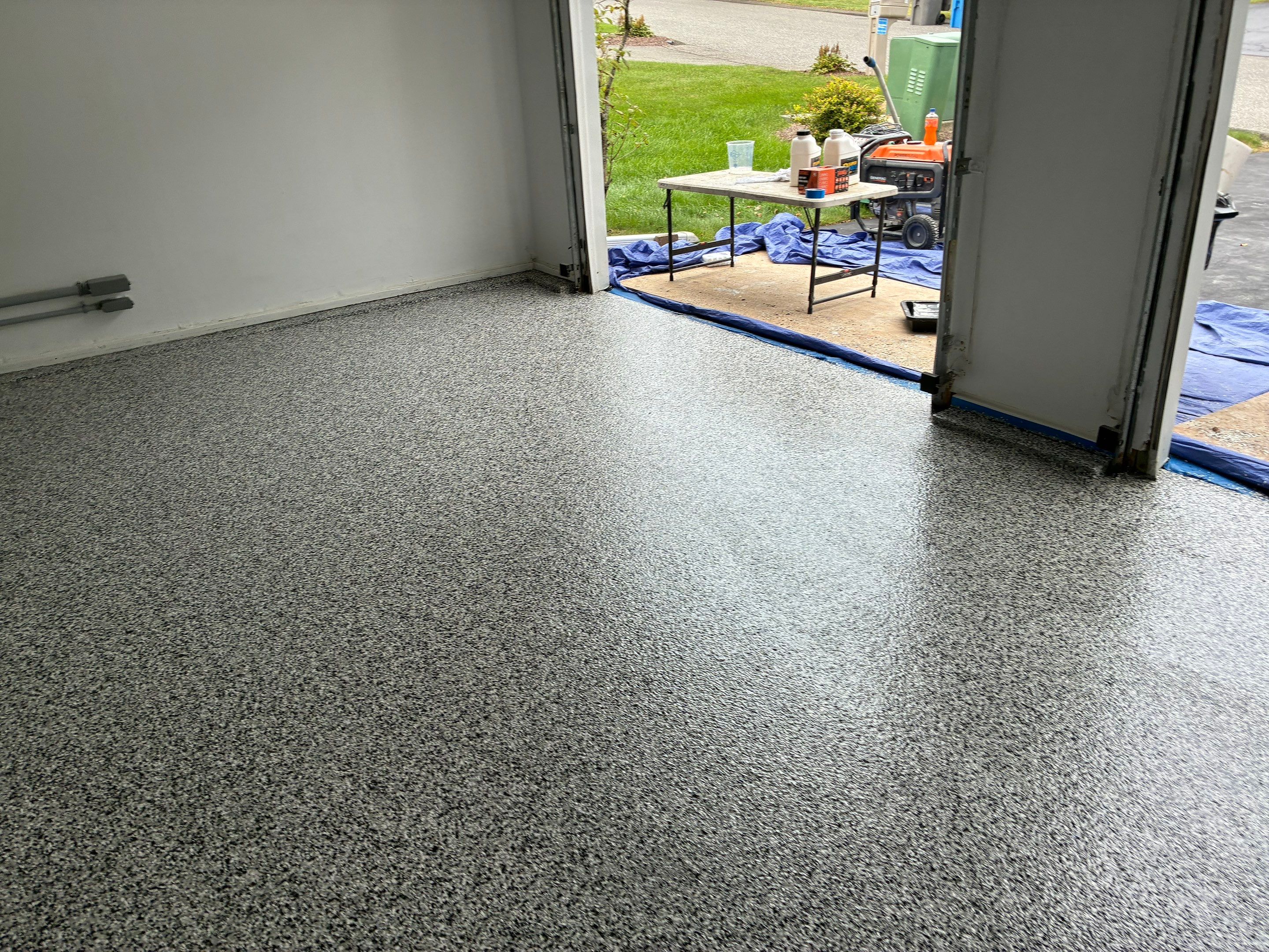 Beautiful Concrete Floor Coating in Domino by DiGiorgi Roofing and Siding Inc