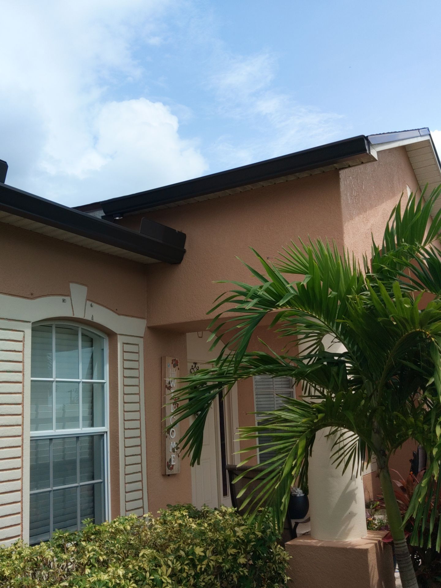 Downspout Installation for Multi-Story Homes in Cape Coral FL by Gutter Professors