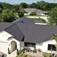 24ga 1.5" Mechanical Seam Dark Bronze by Total Roofing System The Metal Roof Experts