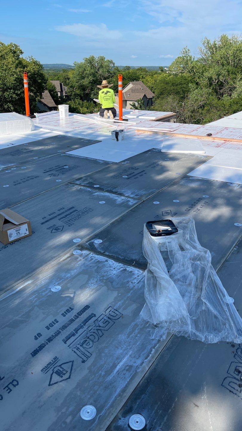 Commercial Flat Roofing System - PVC Membrane & Fluid Applied Coatings  by Titan Commercial & Residential Roofing 