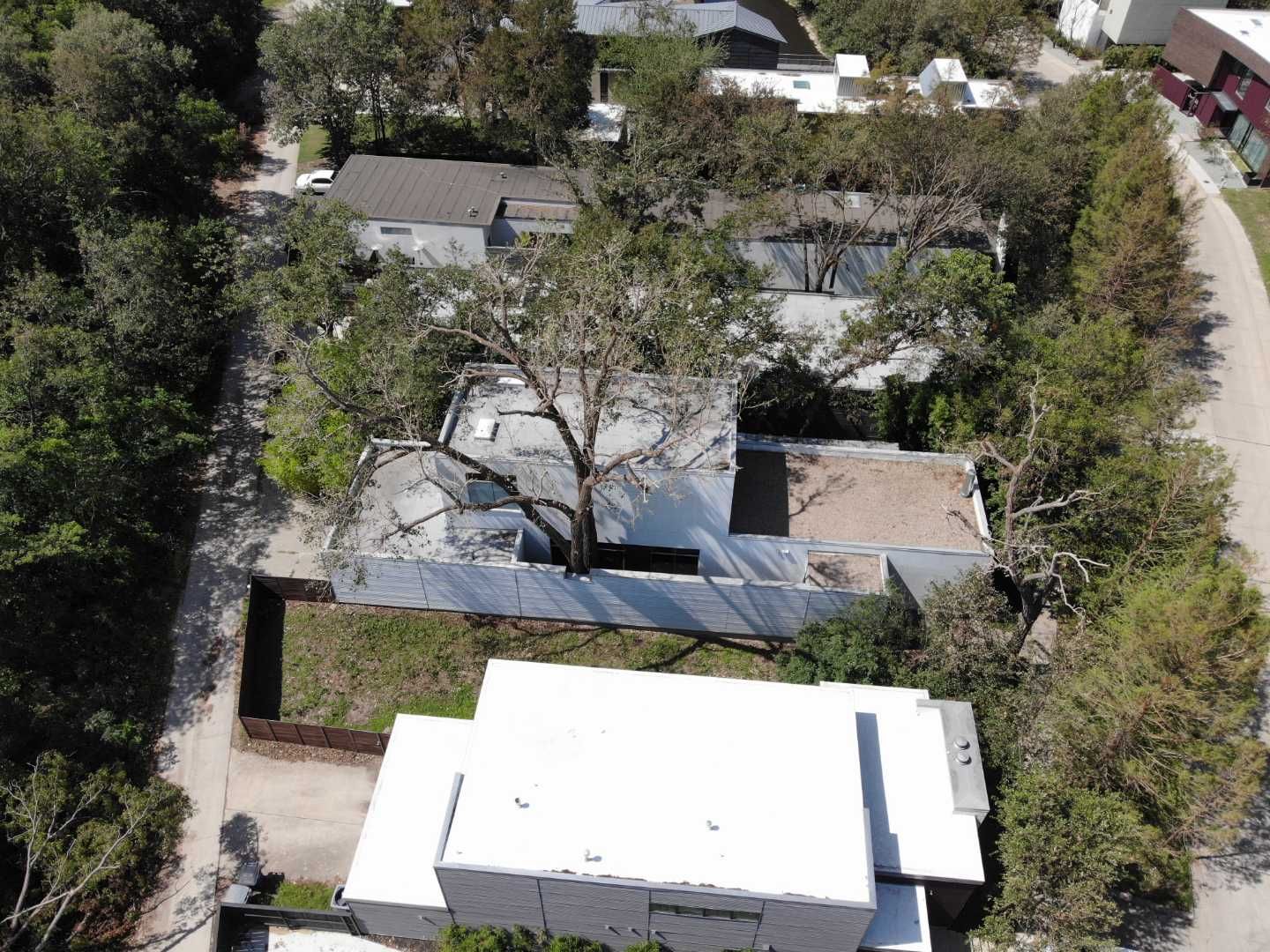 Metal Roofing project using MBCI Flexloc Panels - 22 gauge - silver metallic-in-color by Becker Roofing and Exteriors