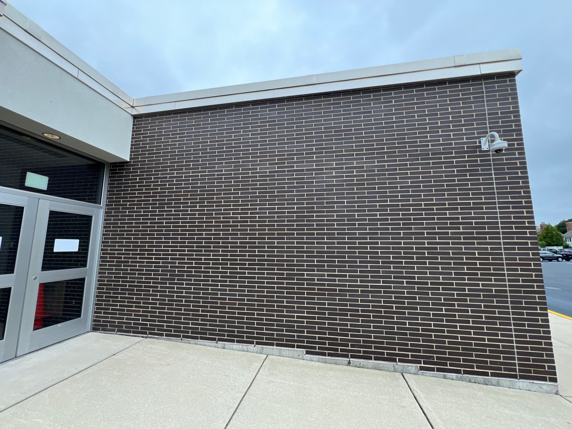 commercial pressure washing using Algaecide, soft wash soap by Northern Power Washing LLC.