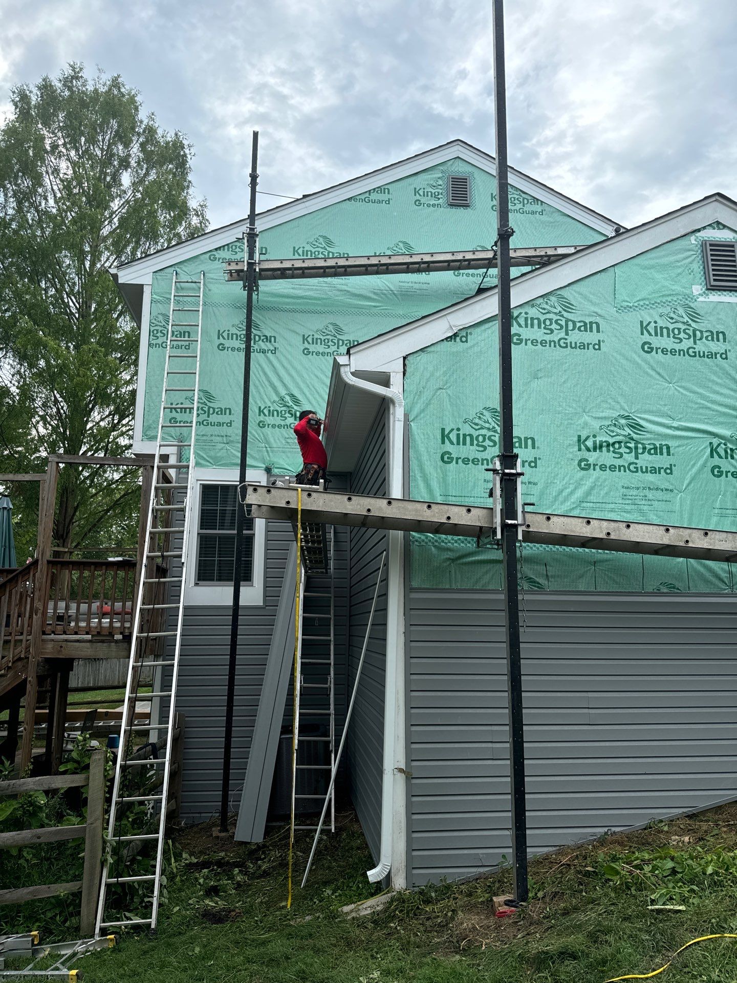 New Prodigy siding with One-piece insulated siding system & Exterior painting   by Alpha Design Services