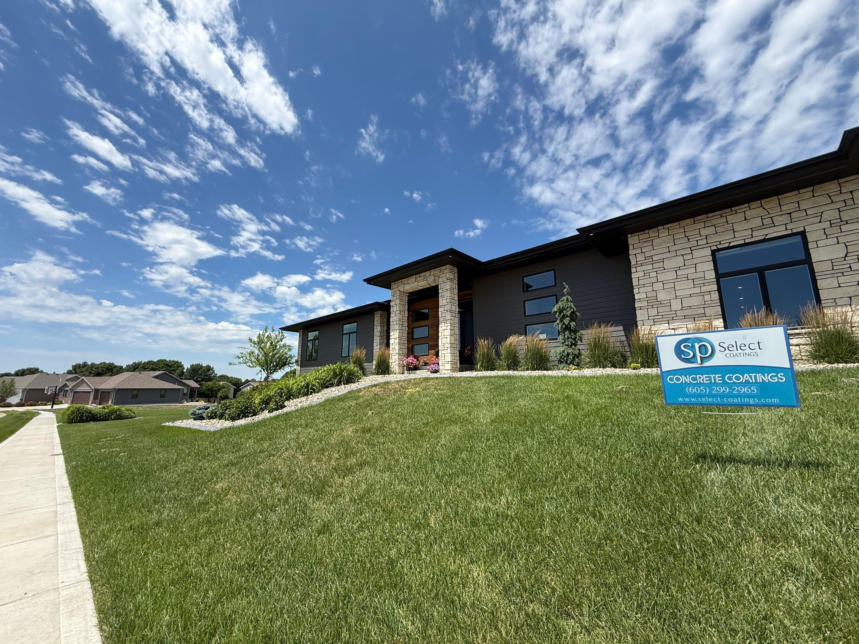 Gravel Flake Garage Floor Coating in Yankton by Select Painting, Coatings & Garage Cabinets